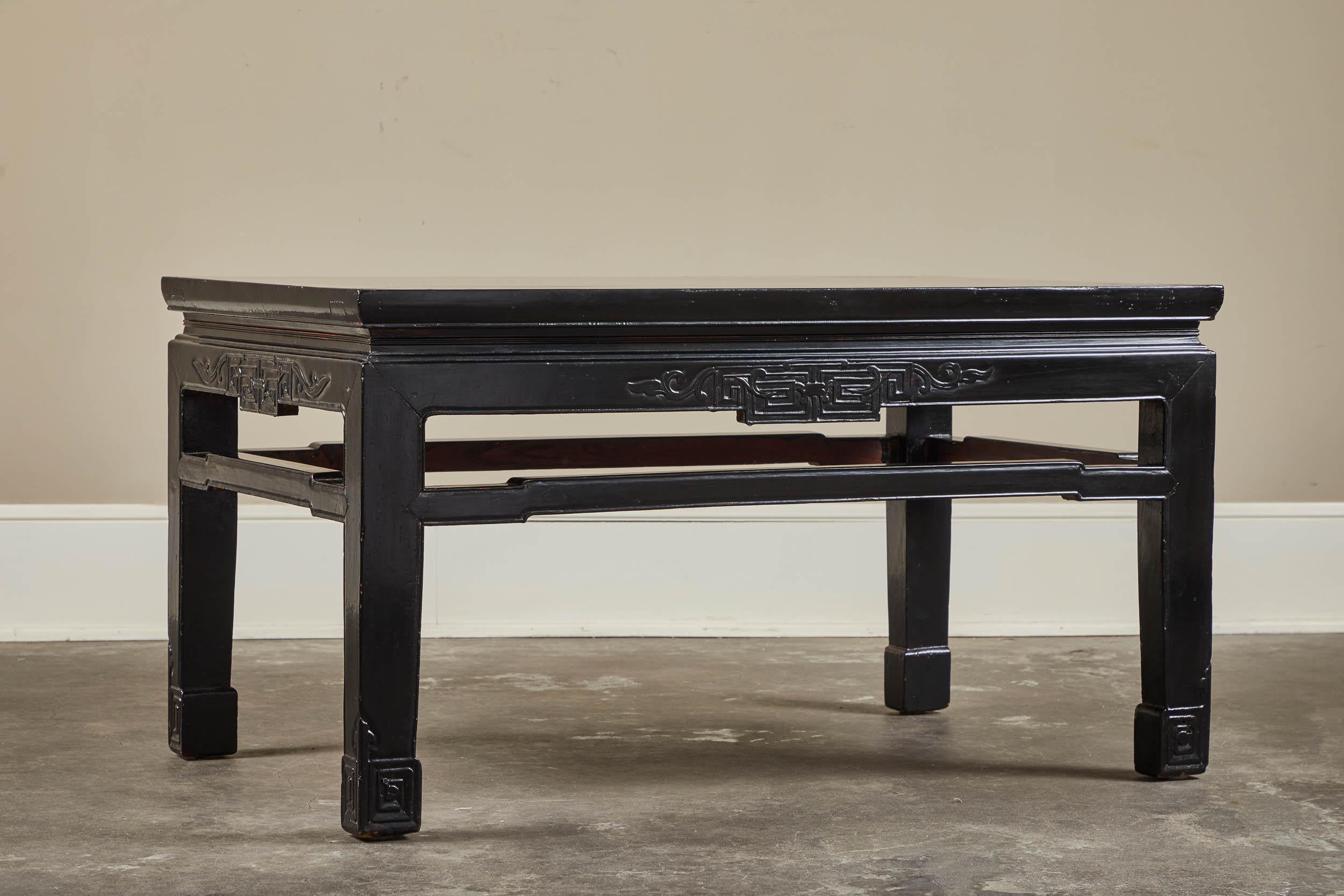 An 18th century low black lacquer kang table from Shanxi, China. Unusual in size.