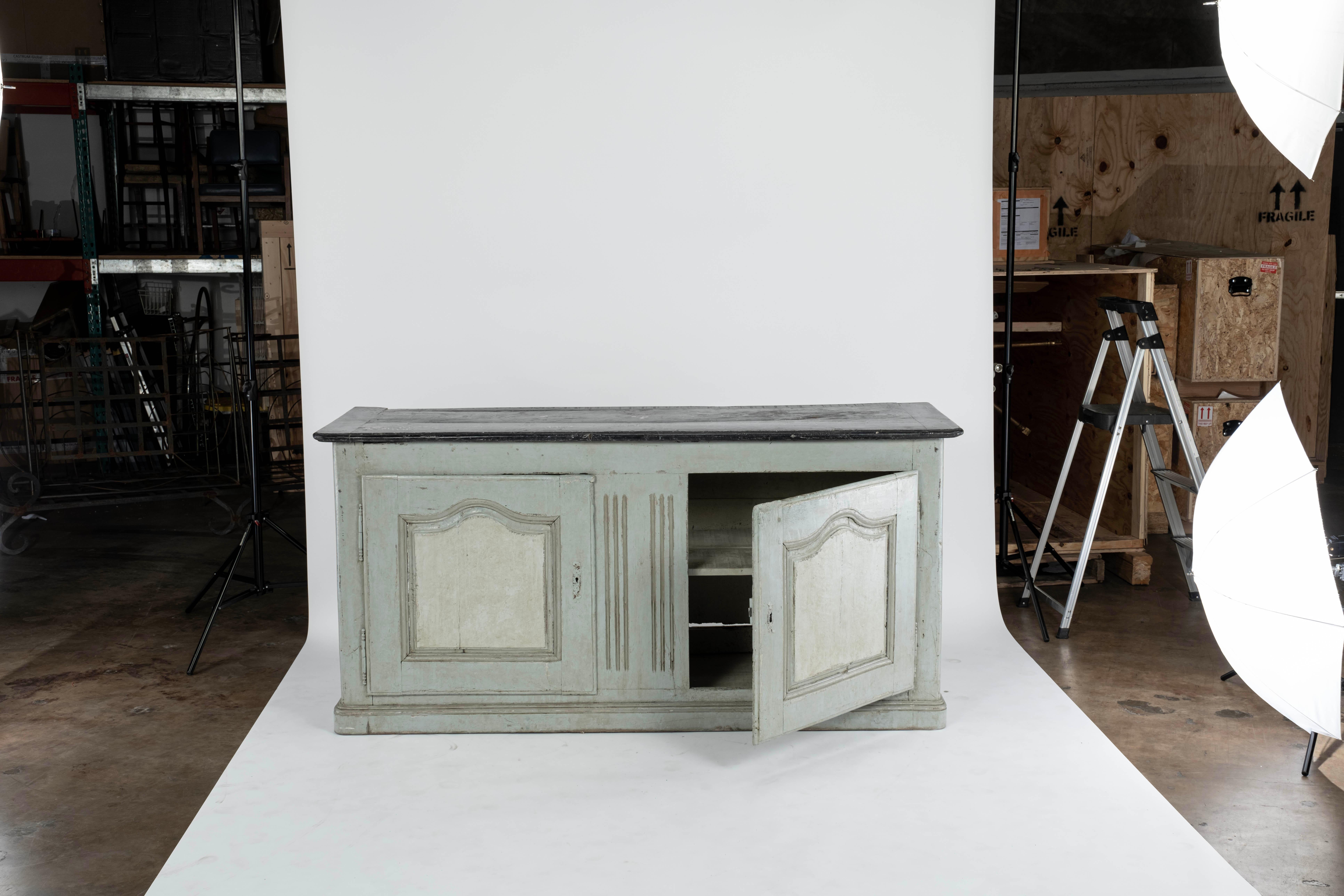 Painted Louis XV two door buffet with a black painted top and one shelf inside.