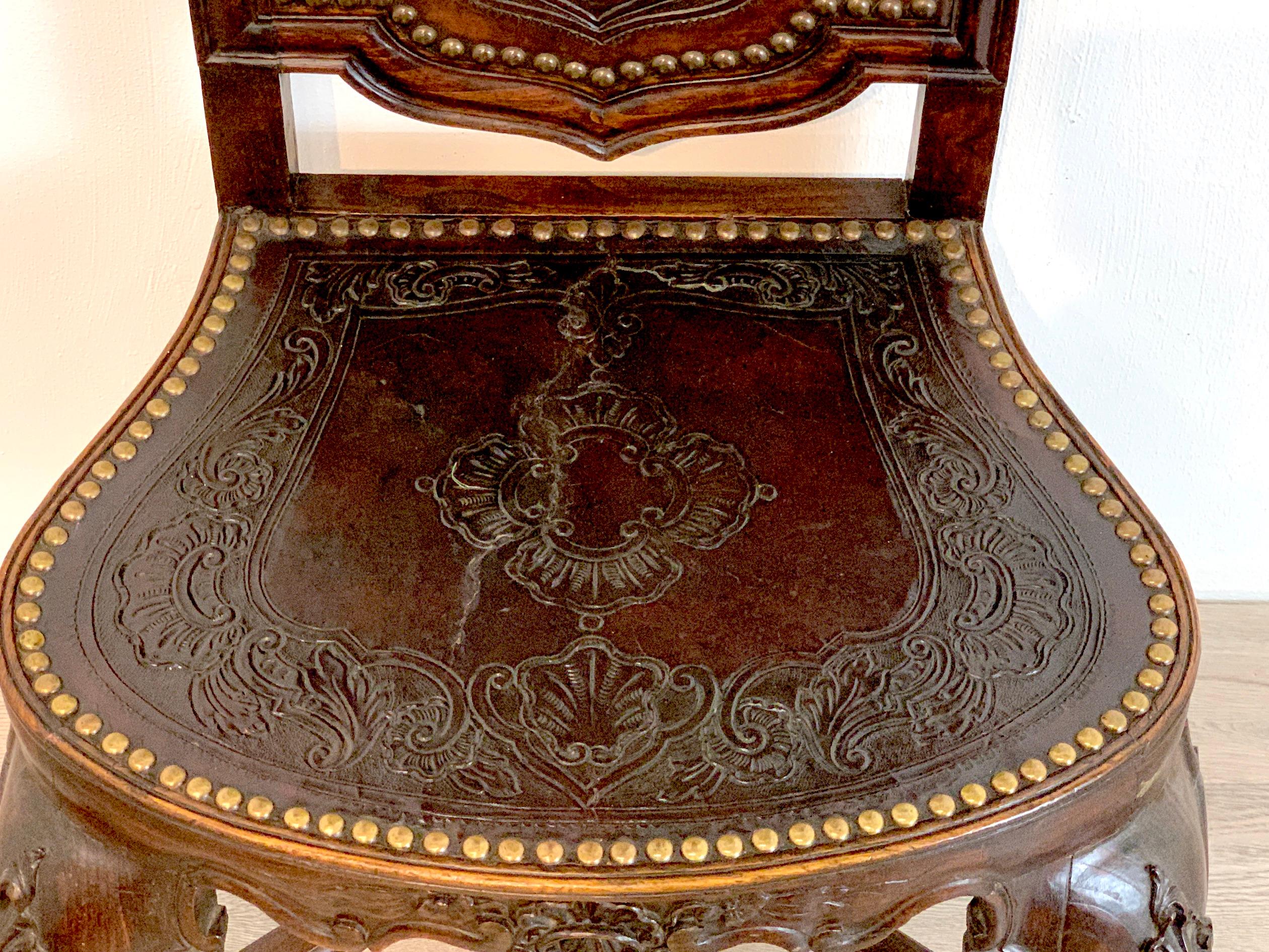 18th C Portuguese Carved Mahogany and Embossed Leather Highback Chair In Good Condition For Sale In Atlanta, GA