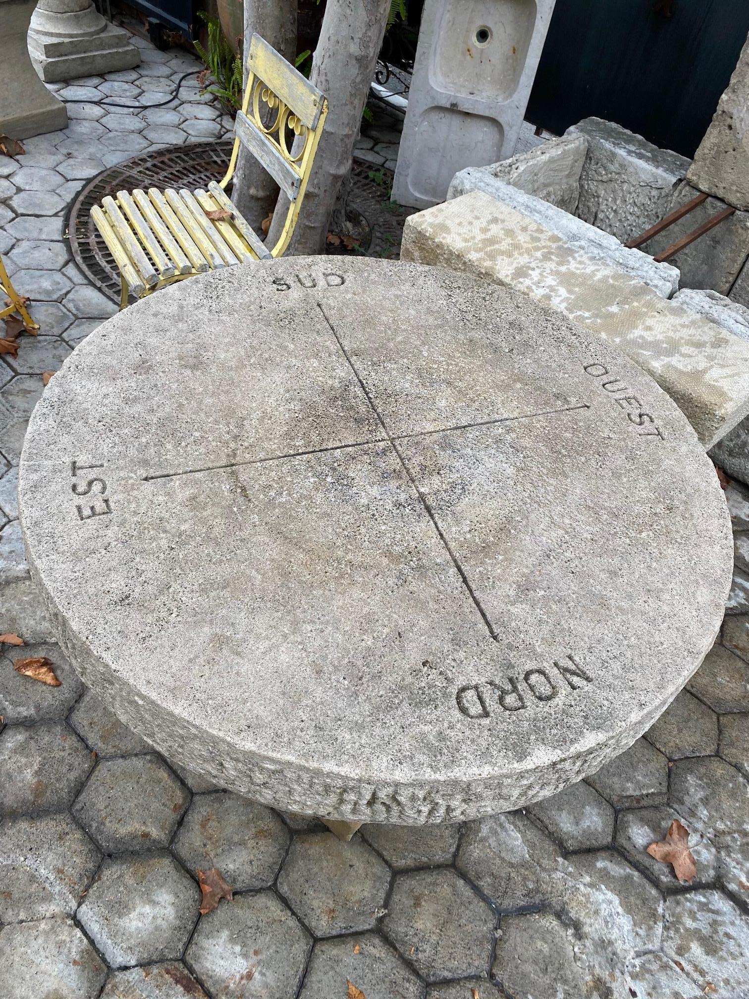 round stone outdoor table