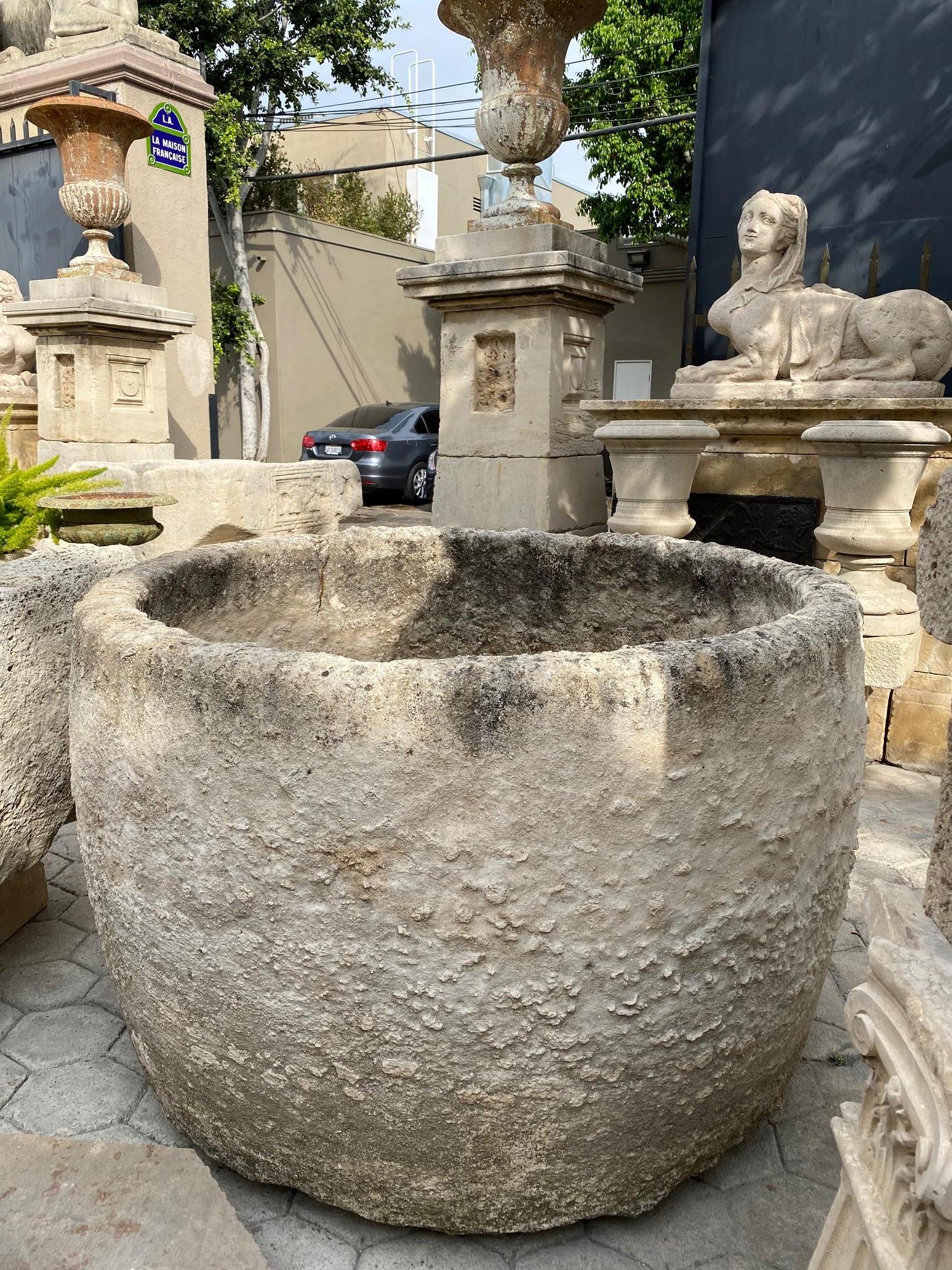 round stone fountain