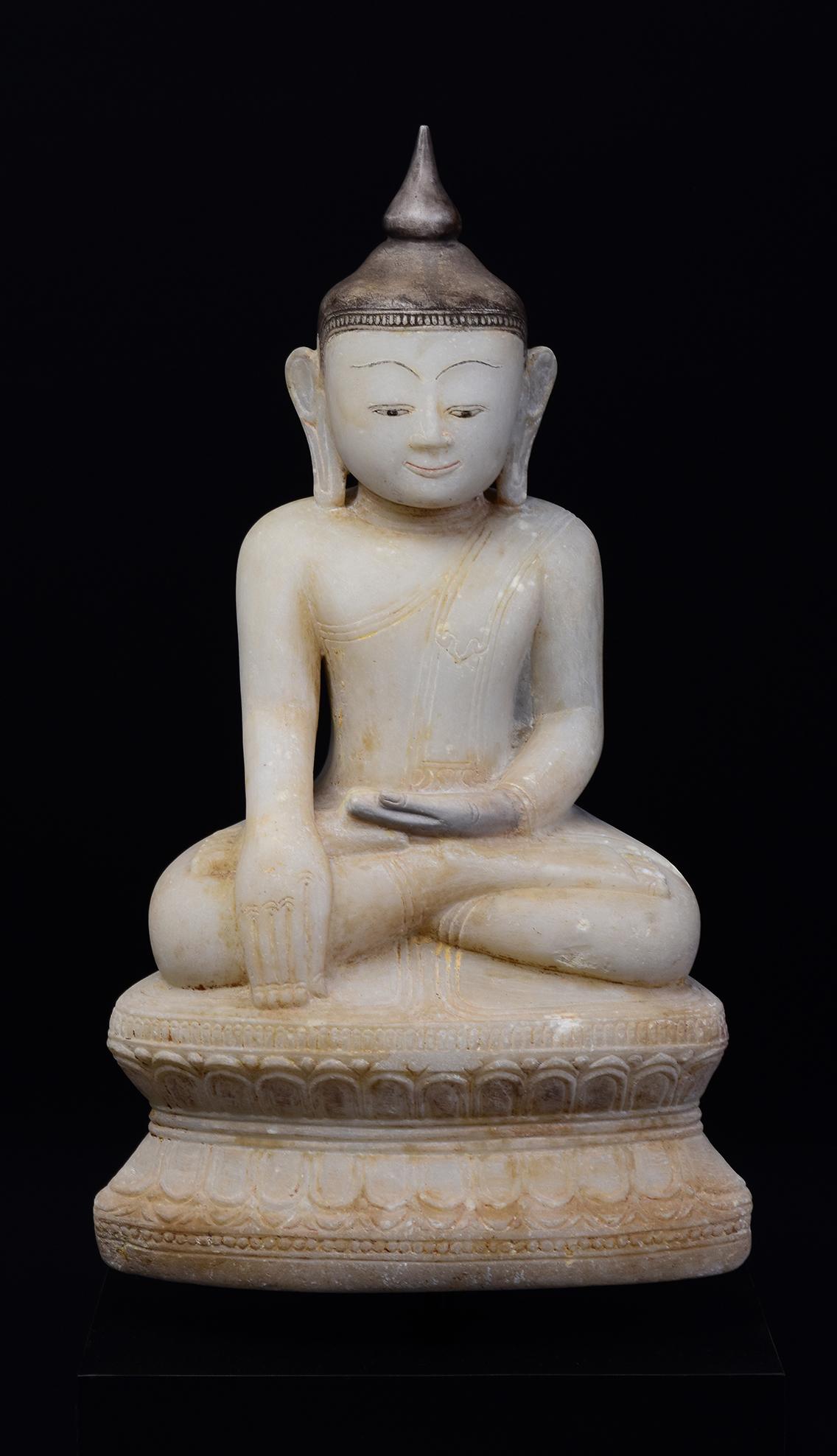 Antique Burmese alabaster Buddha sitting in Mara Vijaya (calling the earth to witness) posture on double lotus base.

Age: Burma, Shan Period, 18th Century
Size excluding stand: Height 39.3 C.M. / Width 22.2 C.M. / Depth 13.5 C.M.
Height including