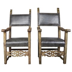 18th Century Spanish Armchairs with Giltwood Finials, a Pair