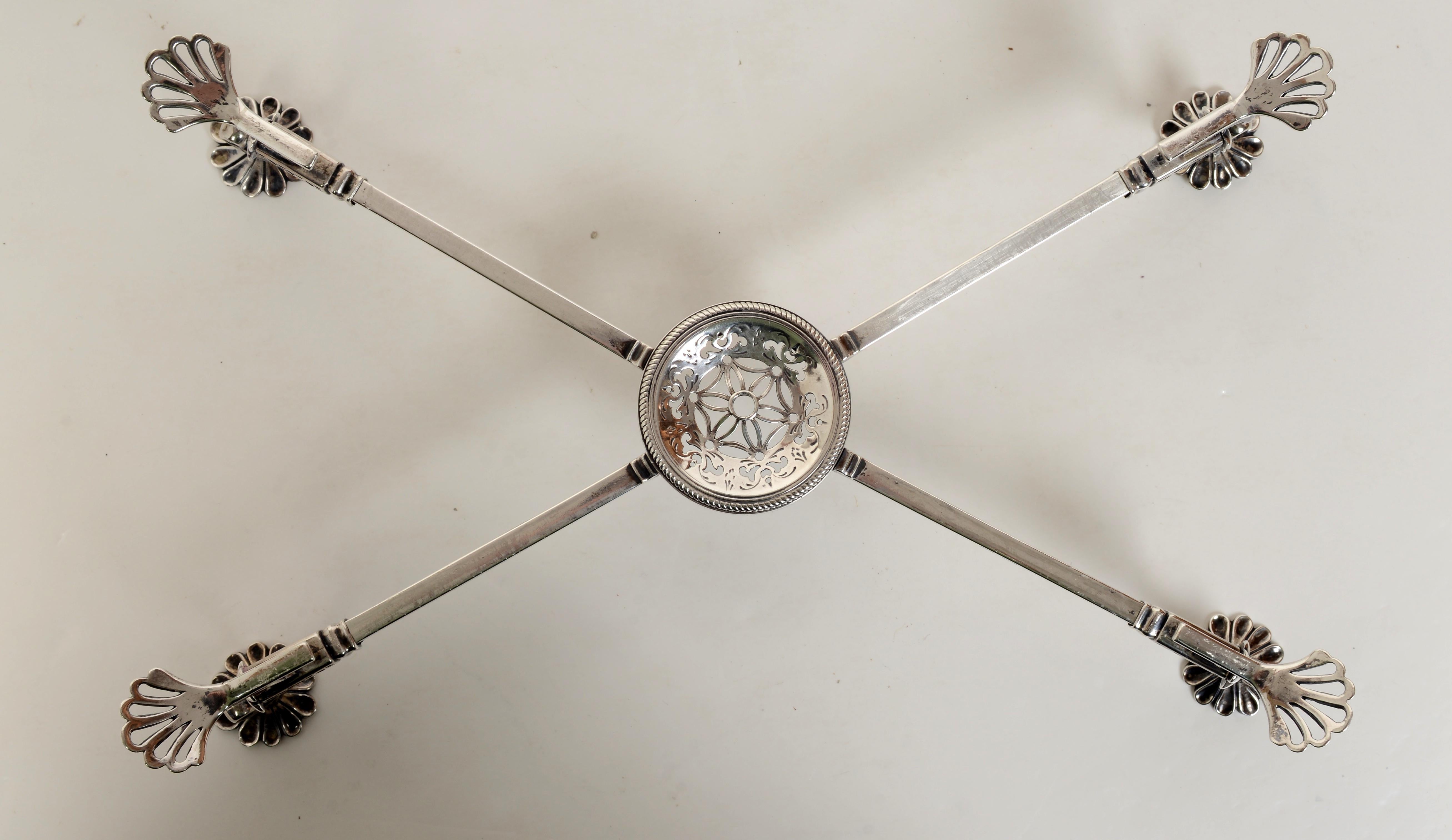 18th c Sterling silver dish Cross by William Plummer c1780. William Plummer was apprenticed to Edward Aldridge, clothworker on 4 February 1746. He was free on 5 February 1755. His first hallmark is entered as a large worker on 8 April 1755. His