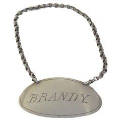 Etiqueta de vino de plata de ley del siglo XIX "BRANDY" de Martin & Hall, Sheffield, 1897
