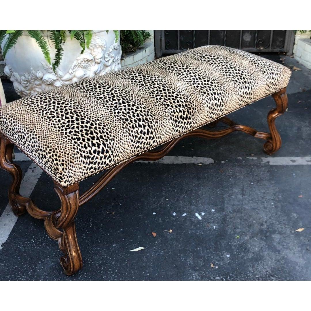 18th century style carved Italian walnut bench by Randy Esada with Clarence House Cheetah.