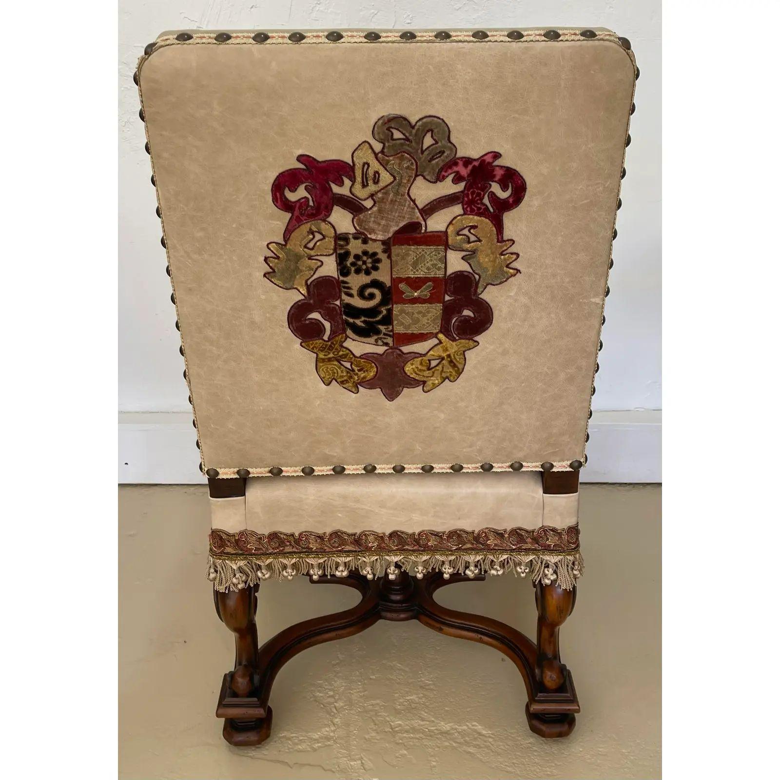 18th century Style Ebanista Spanish Colonial dining chair with leather armorial crest. Priced Each. This listing is for one chair but we actually have eight available. 

Additional information: 
Materials: Leather, Walnut
Color: Beige
Period:
