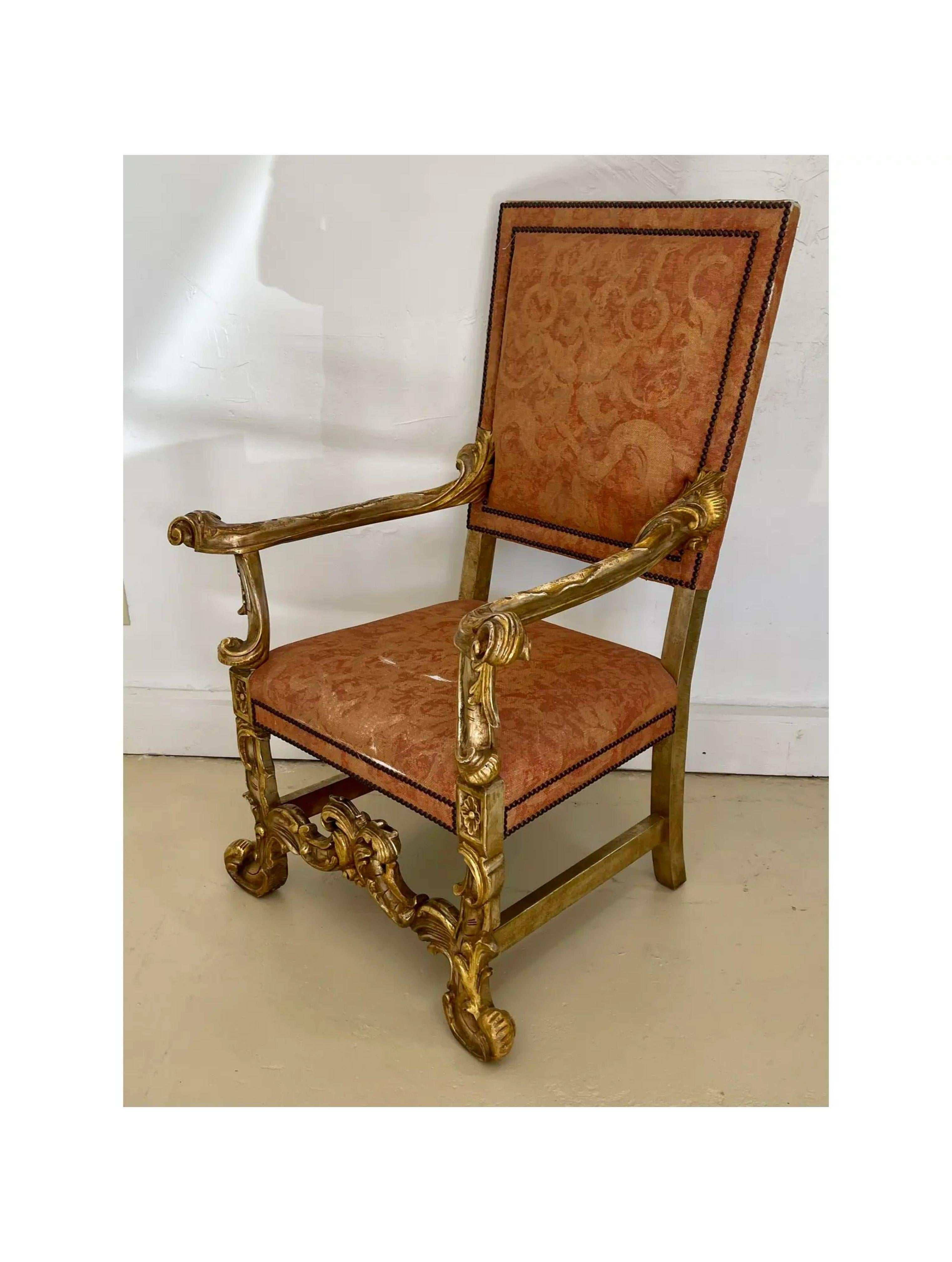 18th Century style Ebanista Spanish Colonial Giltwood throne chair. It is exquisitely carved and gilded.

Additional information: 
Materials: Giltwood, Linen
Color: Gold
Brand: Alfonso Marina
Designer: Alfonso Marina
Period: 1990s
Styles: