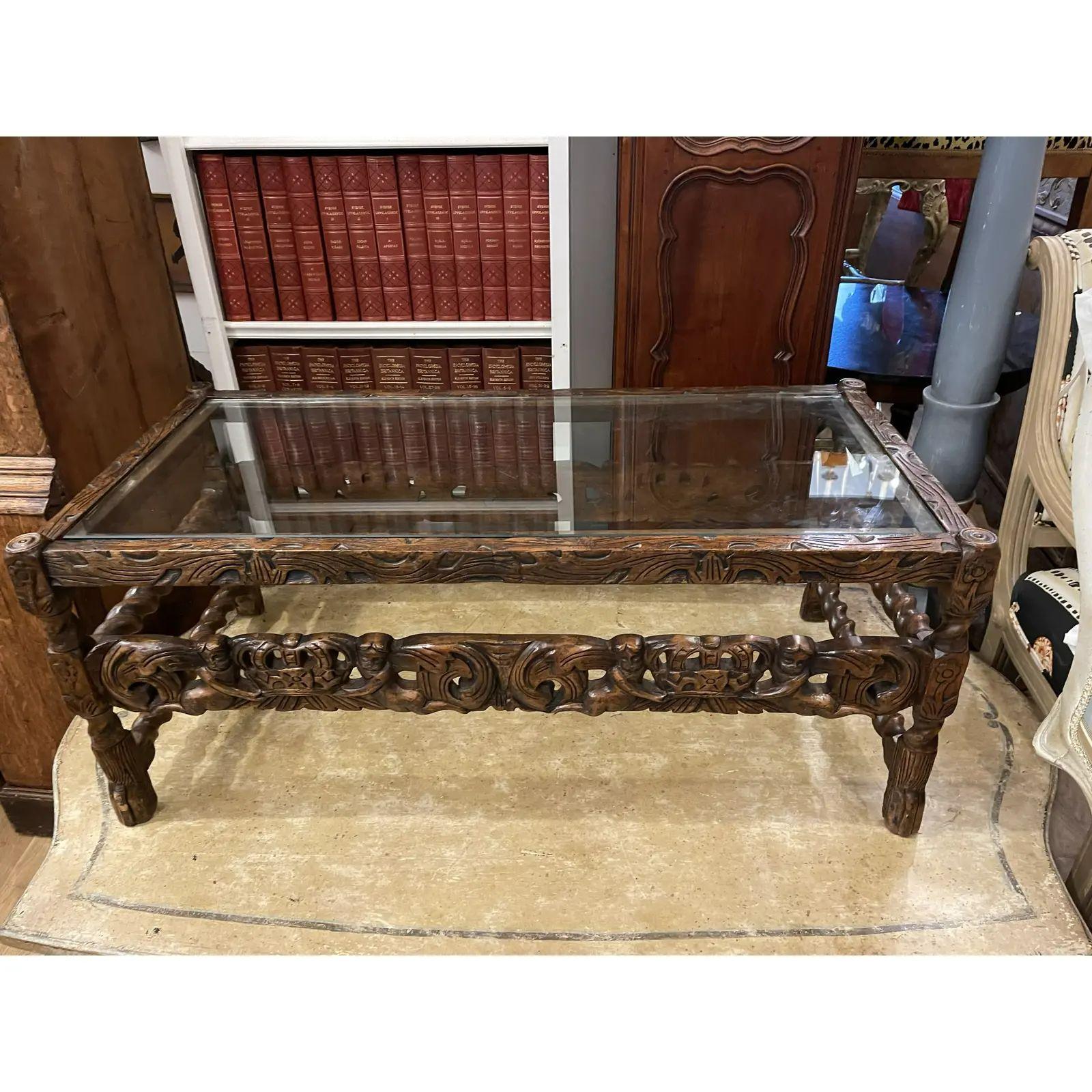 18th C Style Spanish Colonial Petite Coffee or Cocktail Table. It features putti & crown carved decoration in rustic dark walnut.

Additional information: 
Materials: Glass, Walnut
Color: Brown
Period: 2000 - 2009
Styles: Spanish Colonial
Table
