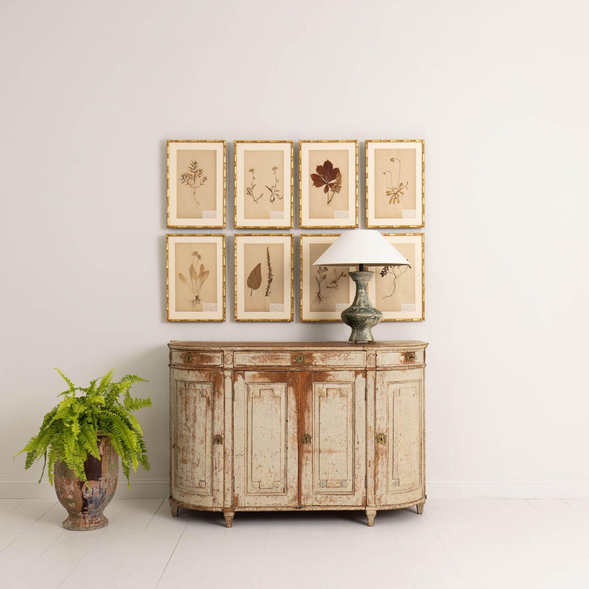A rare Swedish buffet from the Gustavian period with demilune sides and original paint inside and outside, circa 1780. This special piece came from a manor house in Uppland, Sweden. There are four working drawers and raised panel doors that feature