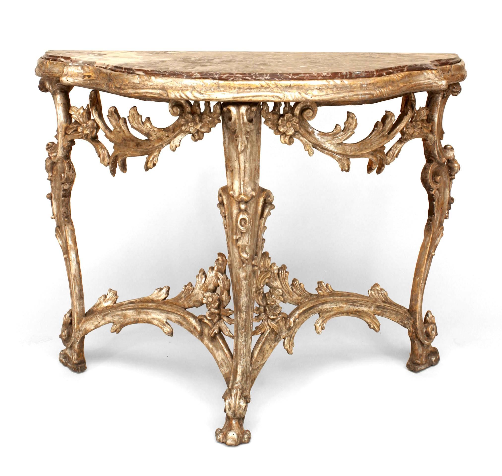 Italian Venetian (18th Century) gilt 3 leg console table with carved floral design stretcher & apron with shaped brown marble top.
