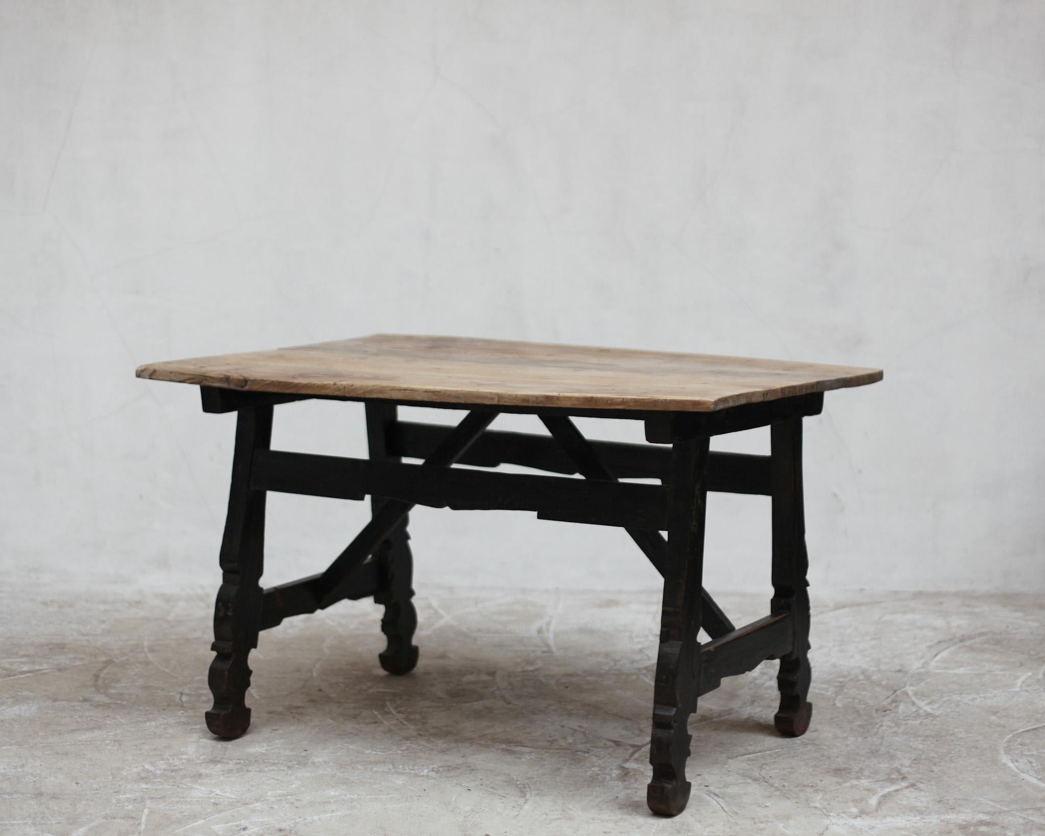 A lovely 18th C. Catalan table with later 19th C. Top.

Classic 
