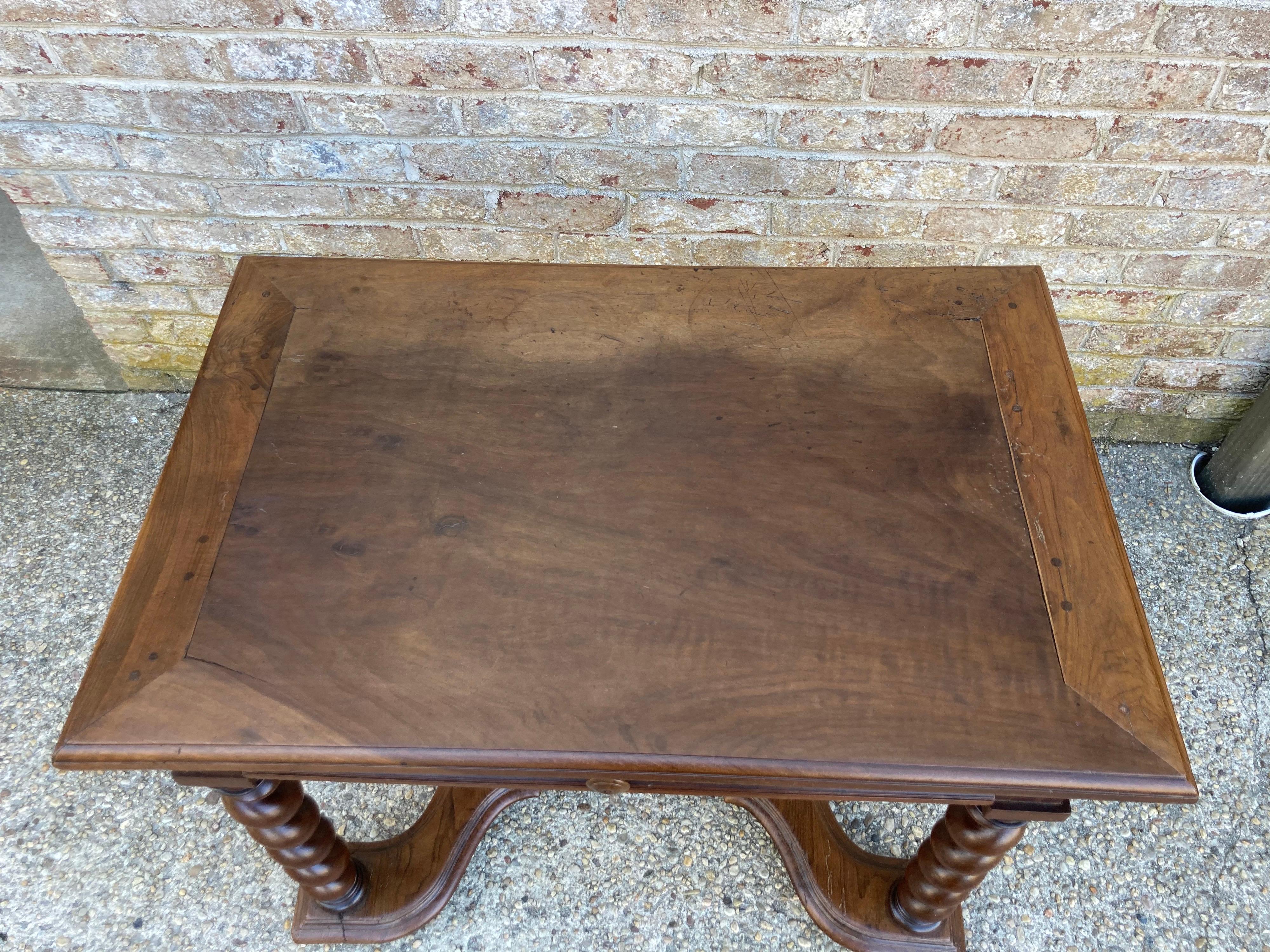 Wonderful walnut table with turned legs and a single drawer.... a great night stand for a King bed.