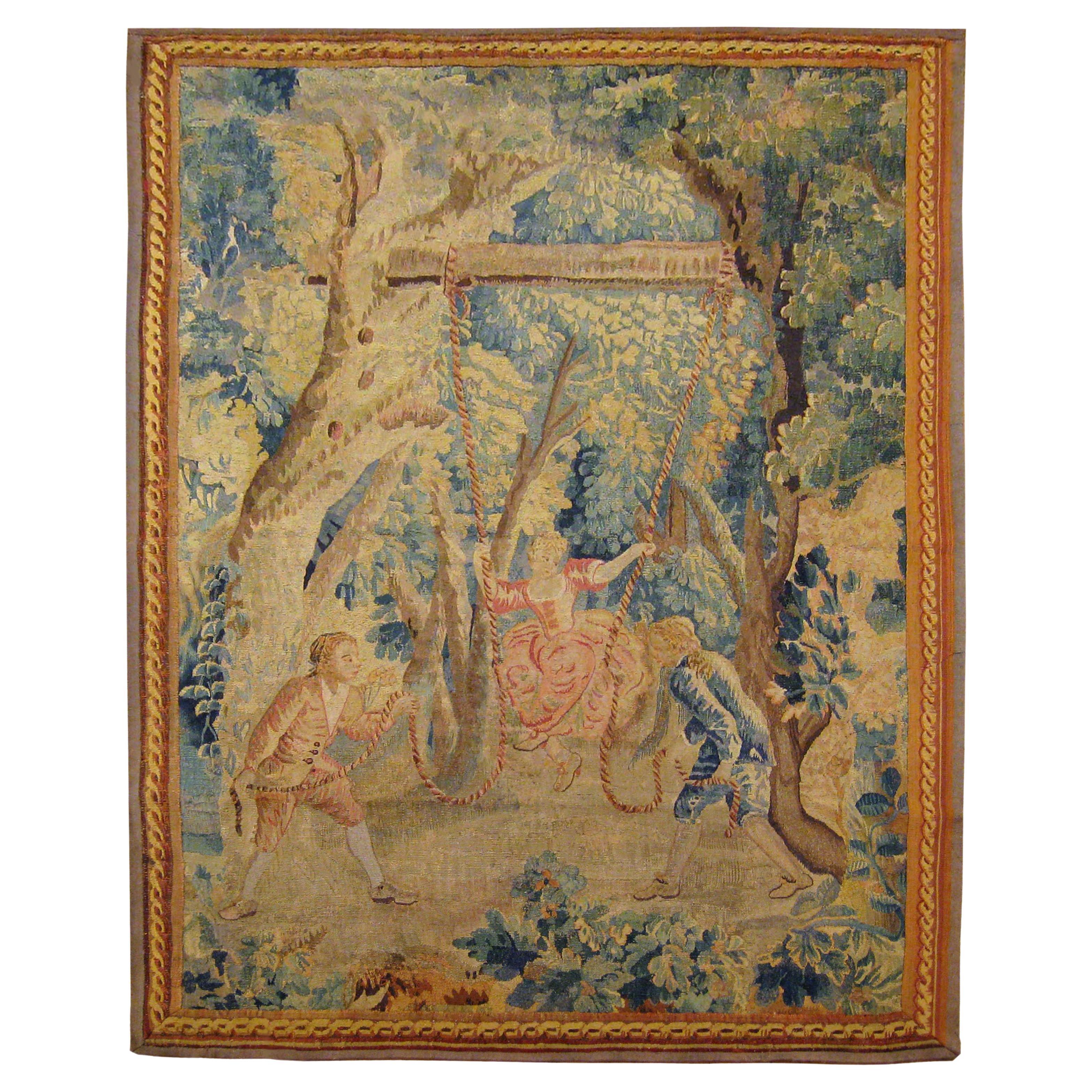 18th Cent., Flemish Rustic Tapestry, with Young Men and Women Playing on a Swing For Sale