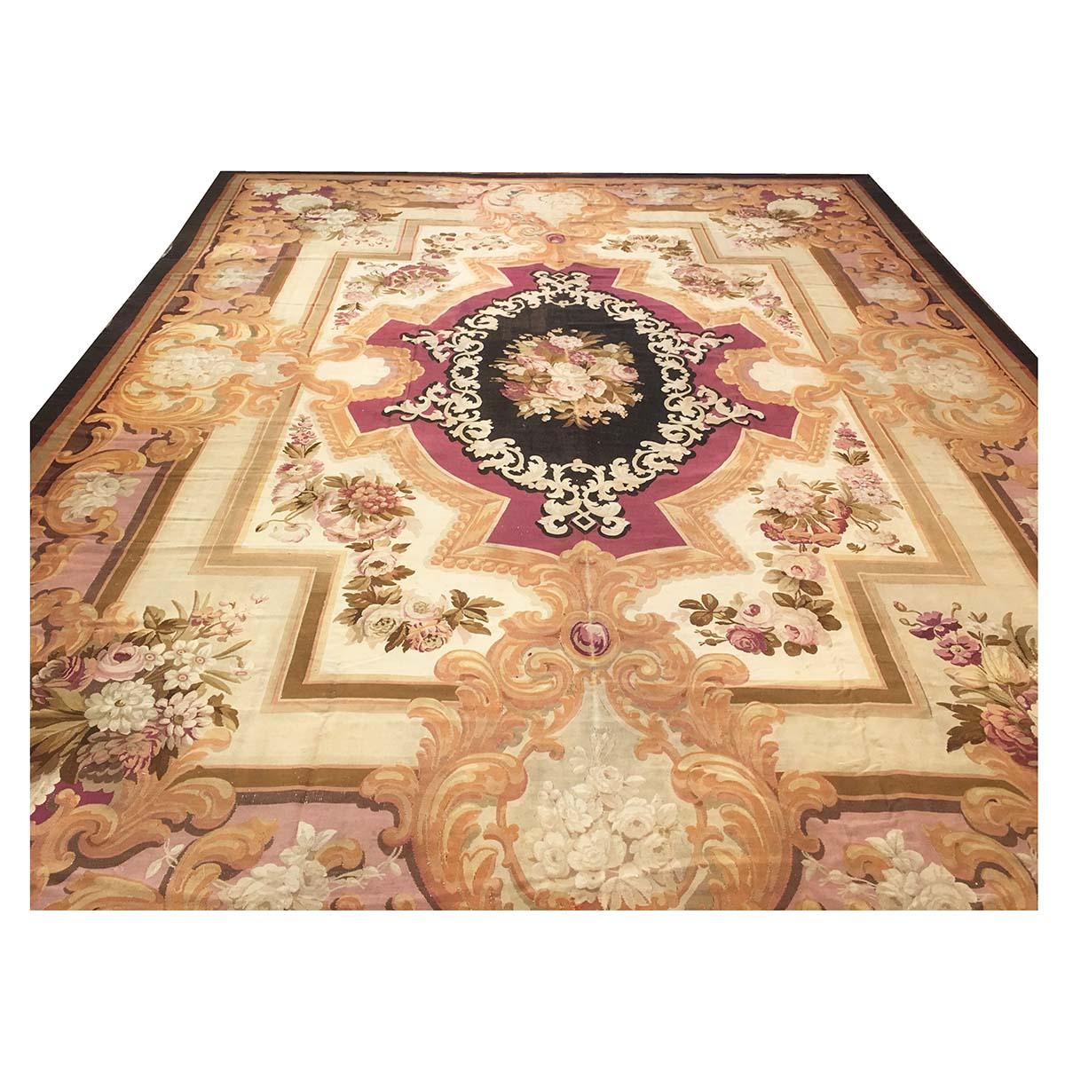 Ashly Fine Rugs Presents an 19th Century Aubusson Tapestry Rug This carpet is stylistic evolution of a Classic French carpet, with strong burgundy and elegant black and soft mauve colors rounded by Ivory fields.
This rug is dated to around the 1880s