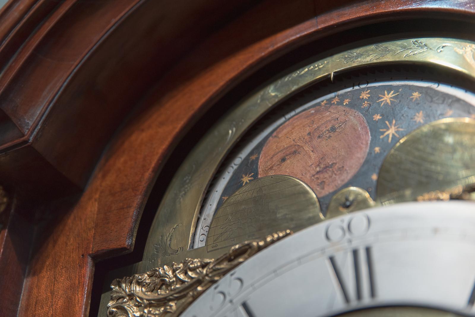 A very attractive 8 day arched brass dial moon phase clock striking the hours on a single bell.
The clock is by the maker Thomas Phippard of Poole and Portsmouth, who was recorded working as an apprentice to the clock maker Robert Finch of London
