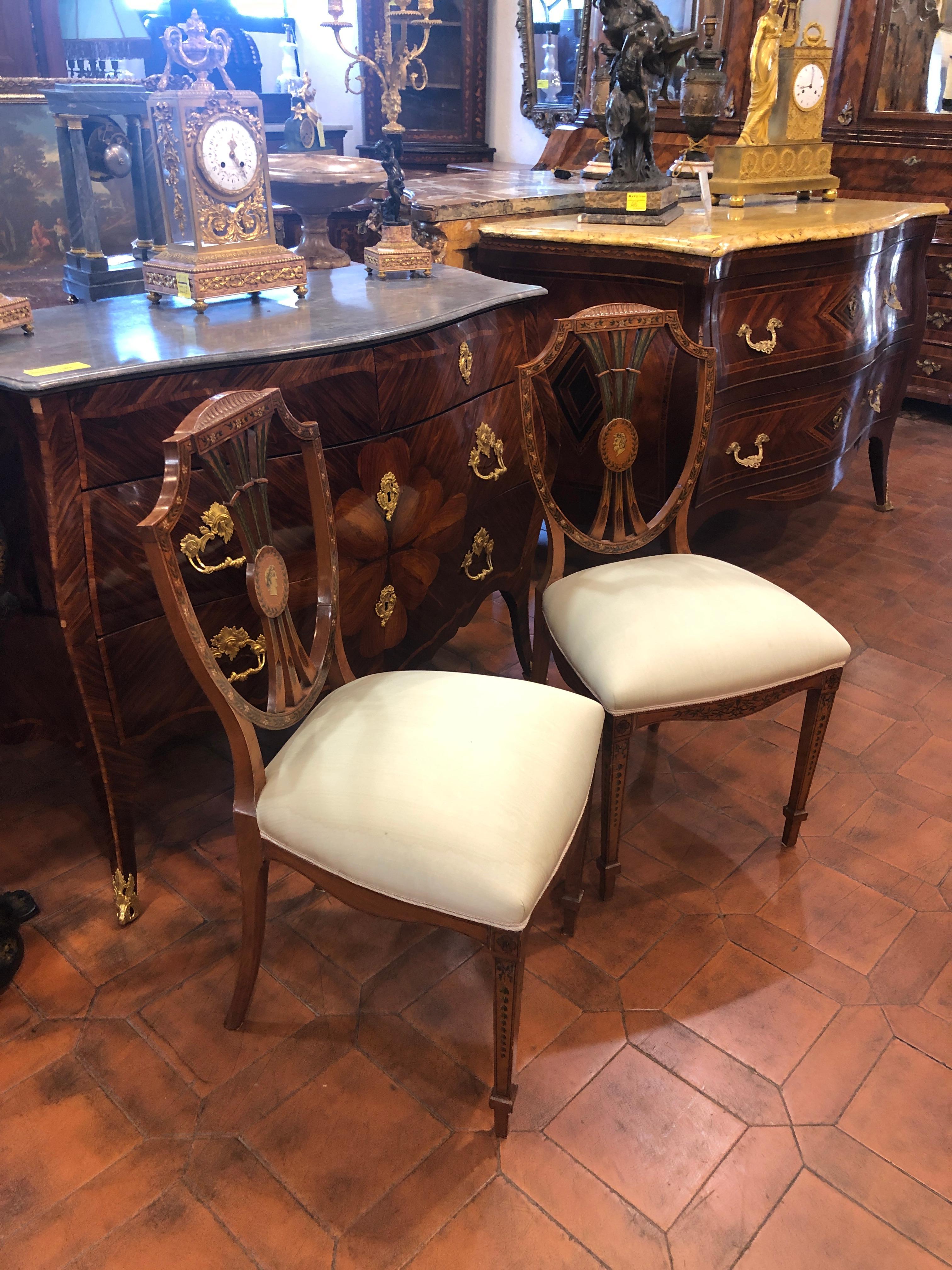 Fantastic pair of English satinwood chairs, in full Adams style, are hand-decorated and finely painted. Note the characteristic features of the most flourishing and important period of the 