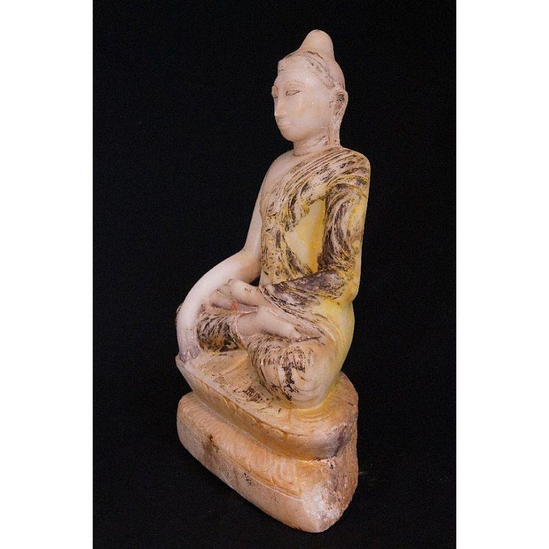 Material: marble
Measures: 56 cm high 
35 cm wide
Weight: 32.25 kgs
Bhumisparsha mudra
Originating from Burma
18th century
With Burmese inscriptions in the base.

  