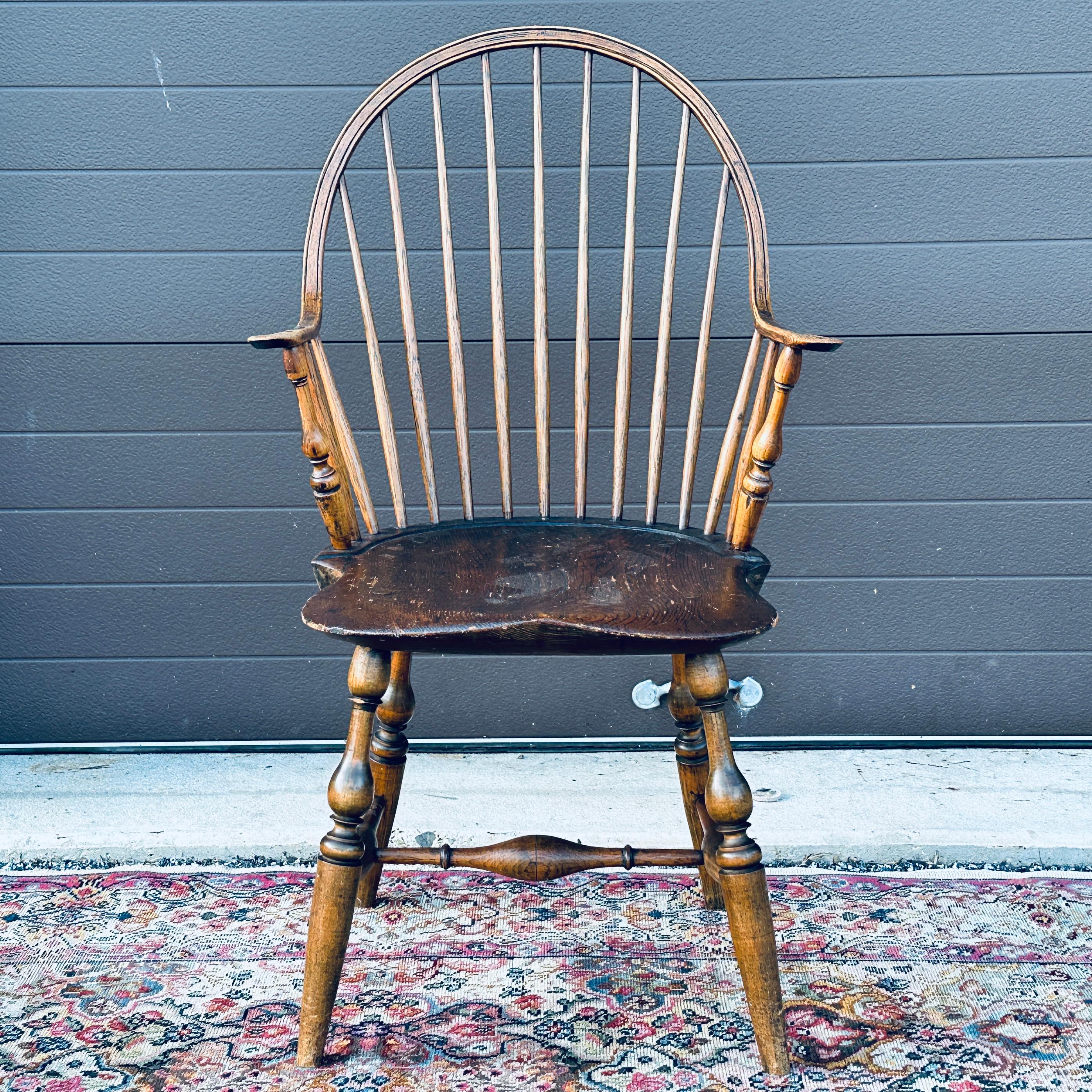 18th Century American Antique Continuous Arm Windsor Chair purchased at the Prallsville Mills Antique Show in 1998 with provenance label affixed to underside of chair. Attributed to a Connecticut chair maker circa late 18th C.