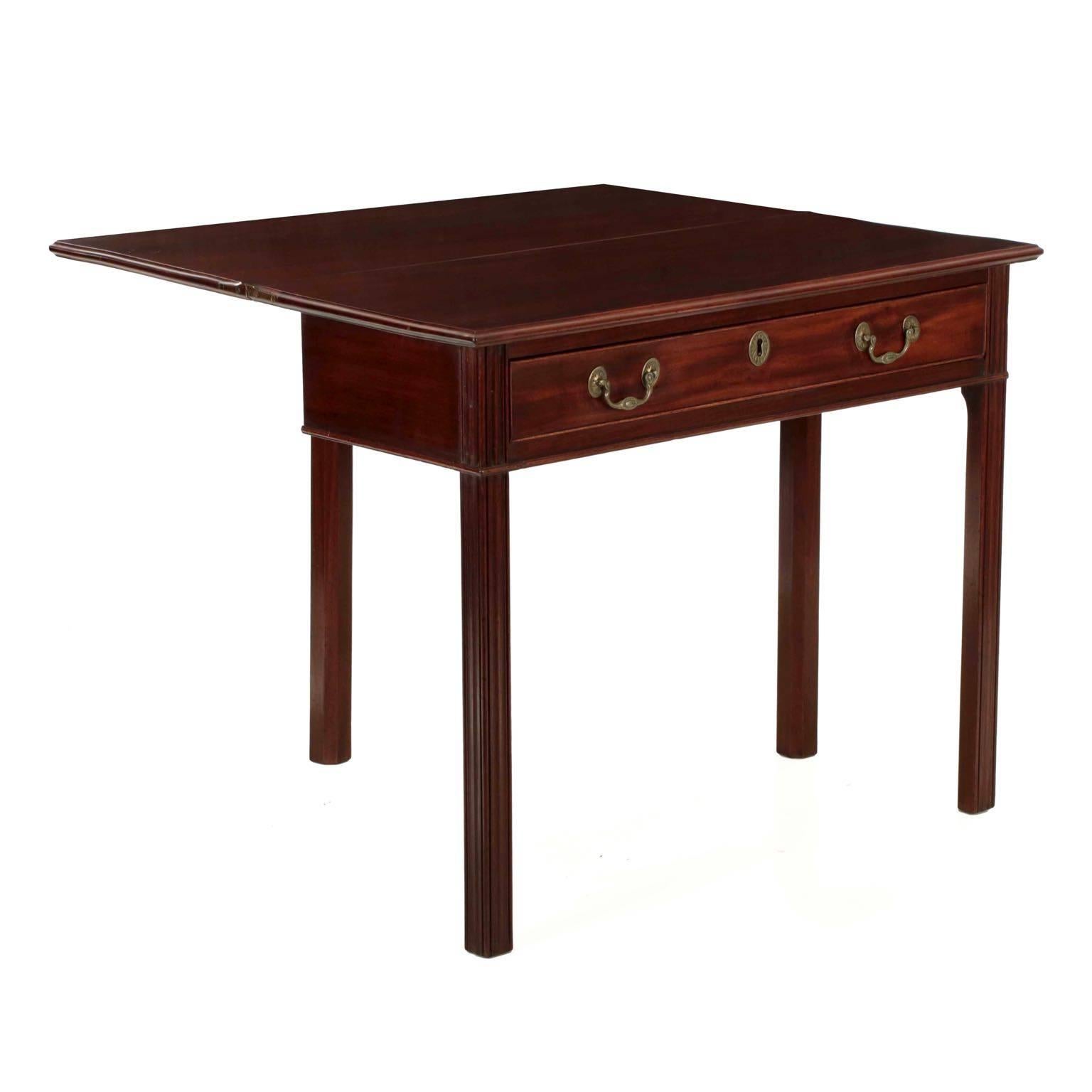 An elegant display of the distinct influence English forms had on the craftsmen of Philadelphia, this fine mahogany card table was executed contemporarily to the same forms in London throughout the last quarter of the 18th century. The materials are