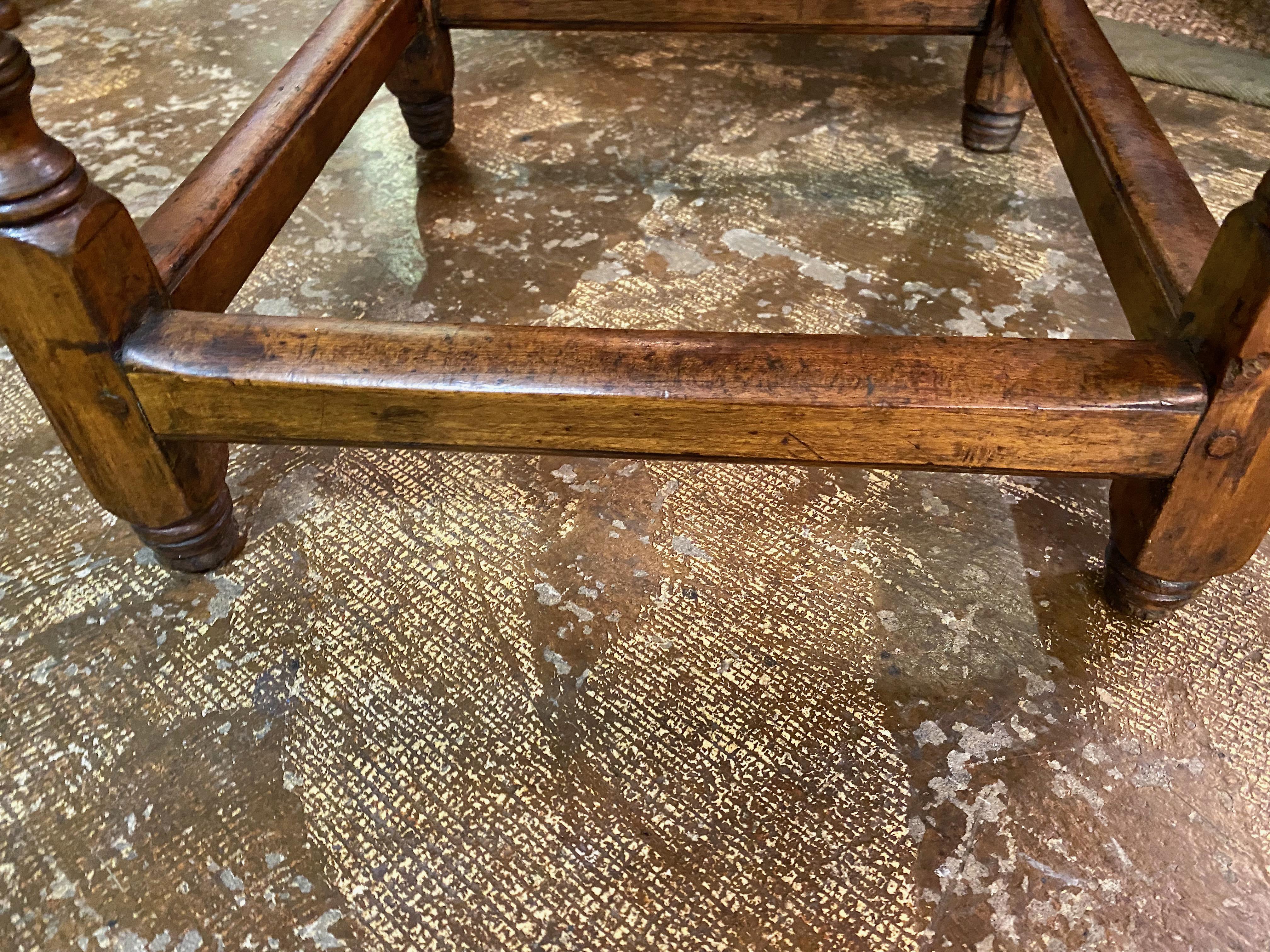 This is a classic small New England mid-18th century tavern table. The table top is pine with breadboard ends; the supporting frame is maple. This type of table was prevalent in Colonial era and was commonly found in taverns and homes. This table is