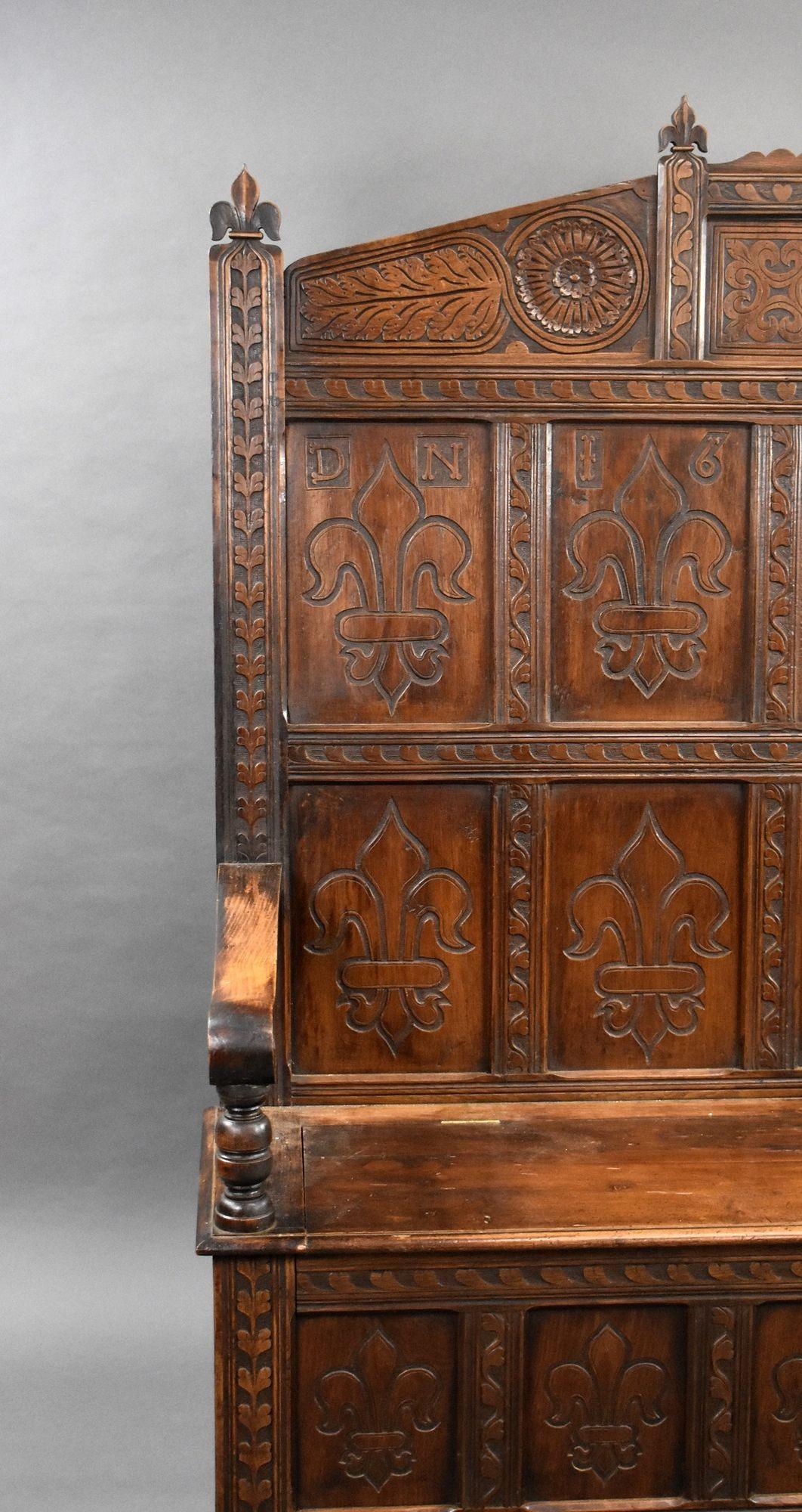 18th Century and Earlier 18th Century and later Carved Oak high back settle/bench