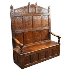 18th Century and later Carved Oak high back settle/bench