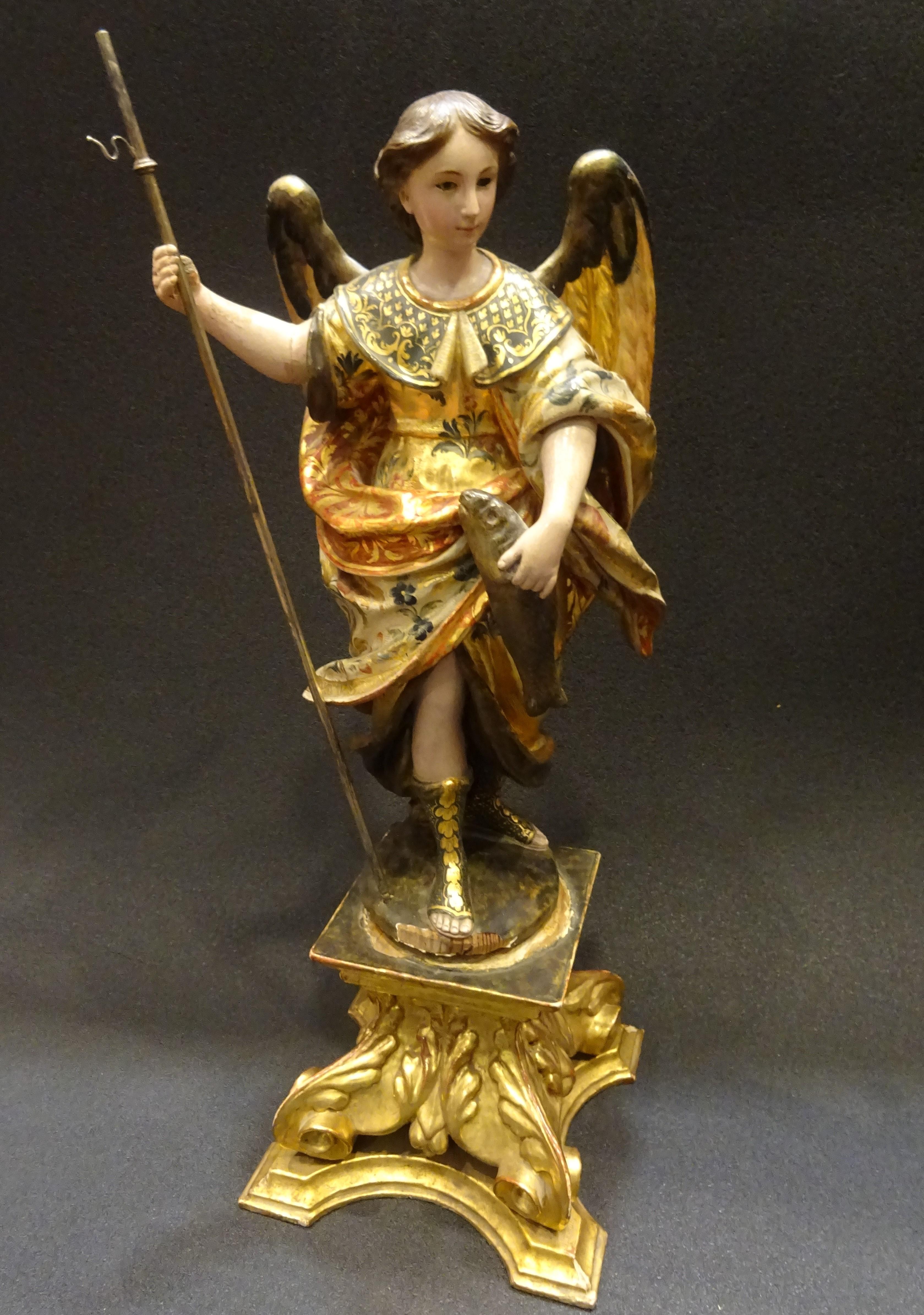 An stunning carved, polychromed and golded wood religious sculpture, ST Rafael, from 