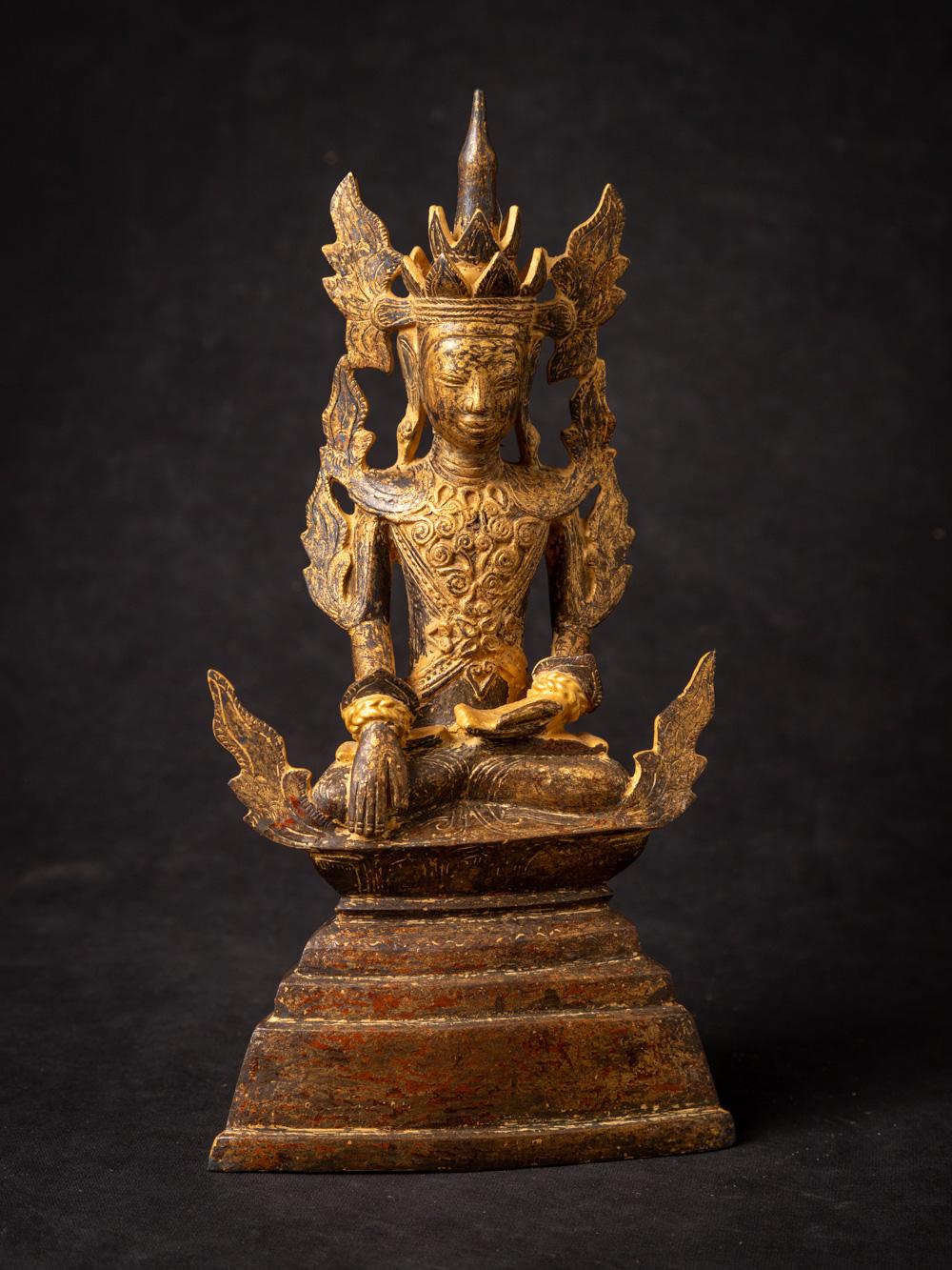 Material : bronze
26,6 cm high
13,6 cm wide and 6,3 cm deep
With traces of the original 24 krt. gilding
Shan (Tai Yai) style
Bhumisparsha mudra
18th century
Was painted with gold paint in the 20th century, which has been partly removed. I think it