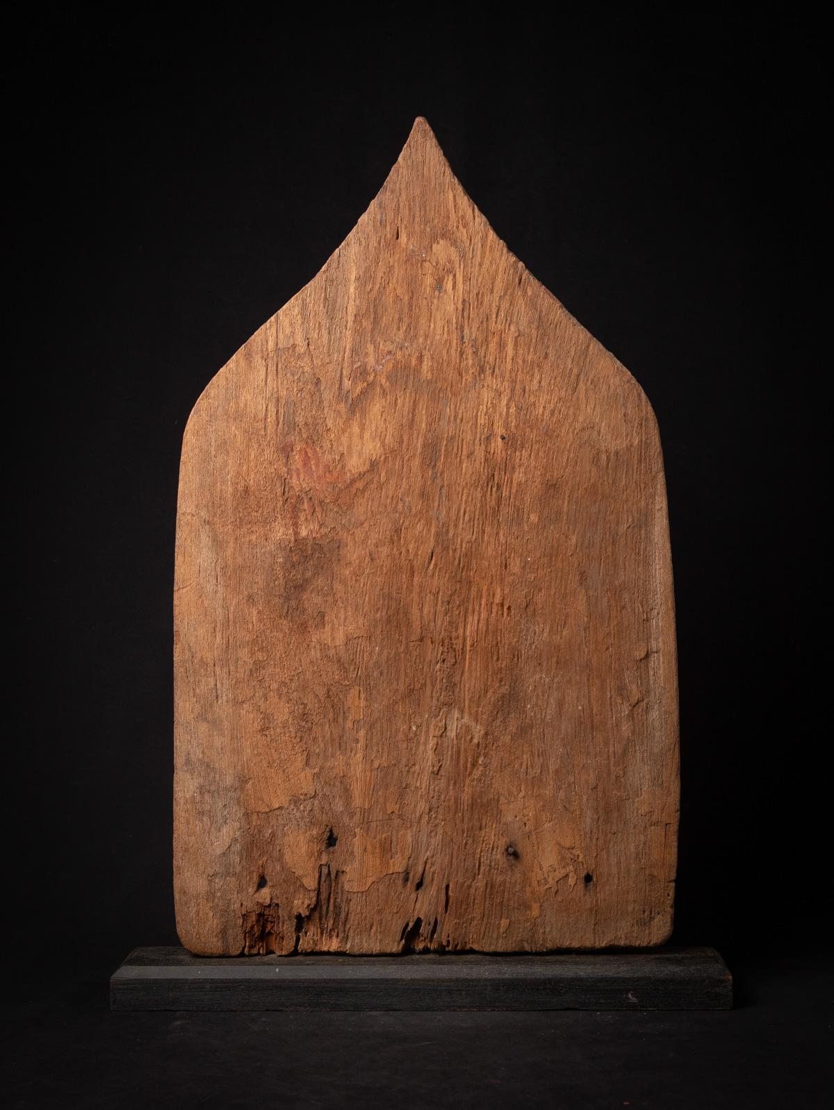 18th Century and Earlier 18th century antique Burmese wooden panel with 16 terracotta Buddha amulets