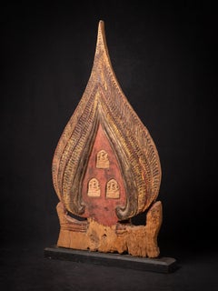 18th century antique Burmese wooden panel with three terracotta Buddha amulets