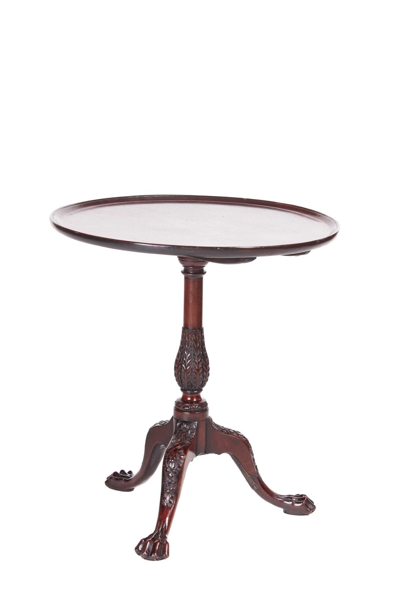 18th century antique carved mahogany dish top tripod table having a splendid mahogany dish tilt-top table supported on a fantastic carved turned bulbous column standing on three elegant carved cabriole legs with claw feet.

Lovely color and