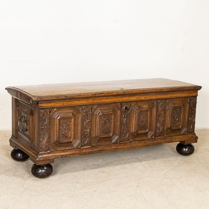It is the incredible hand-carved details that make this trunk or 