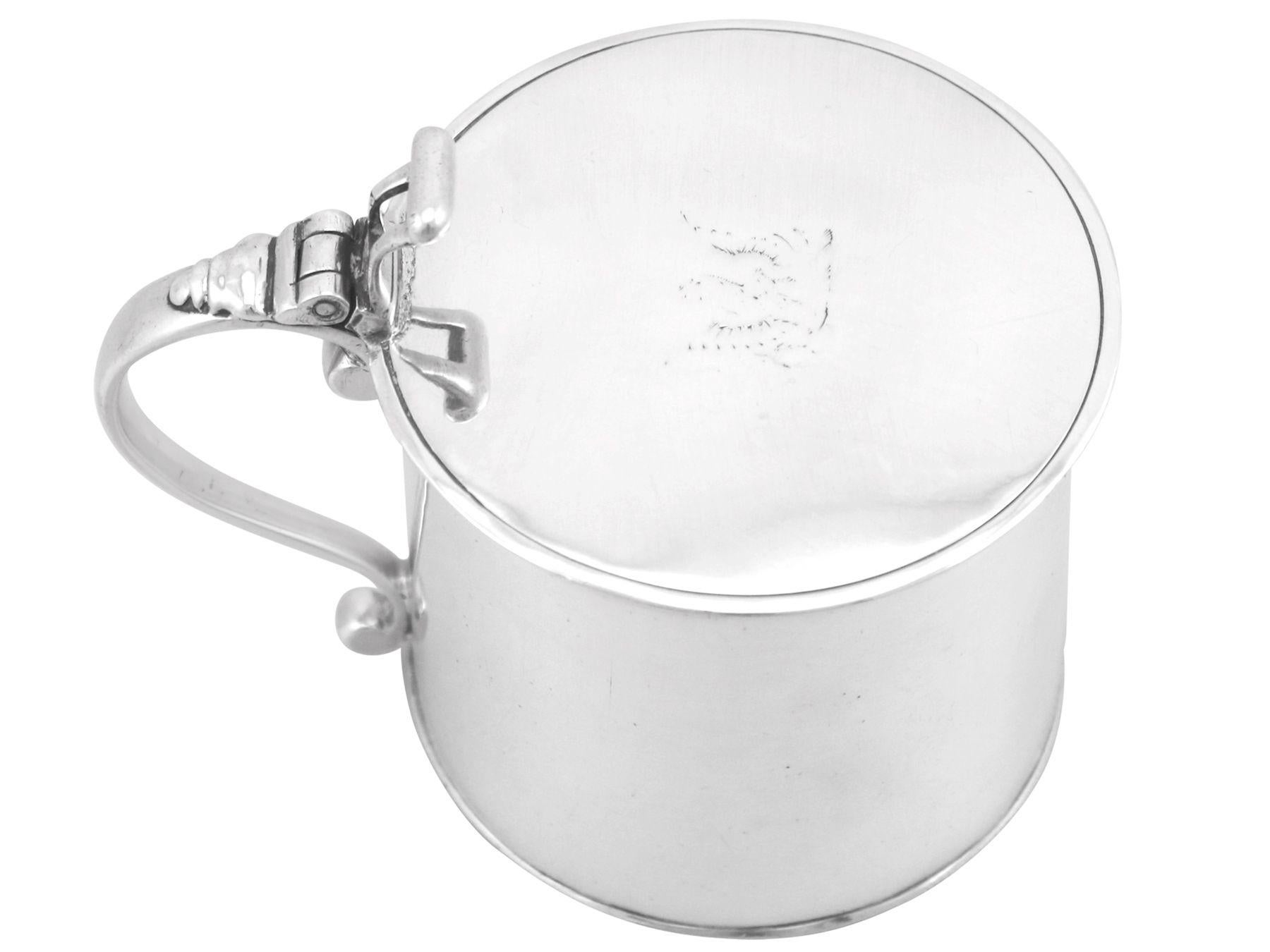 A exceptional antique 18th century English sterling silver drum mustard pot; an addition to our silver cruets / condiments collection.

This exceptional antique George III sterling silver mustard pot has a plain drum form with applied borders to