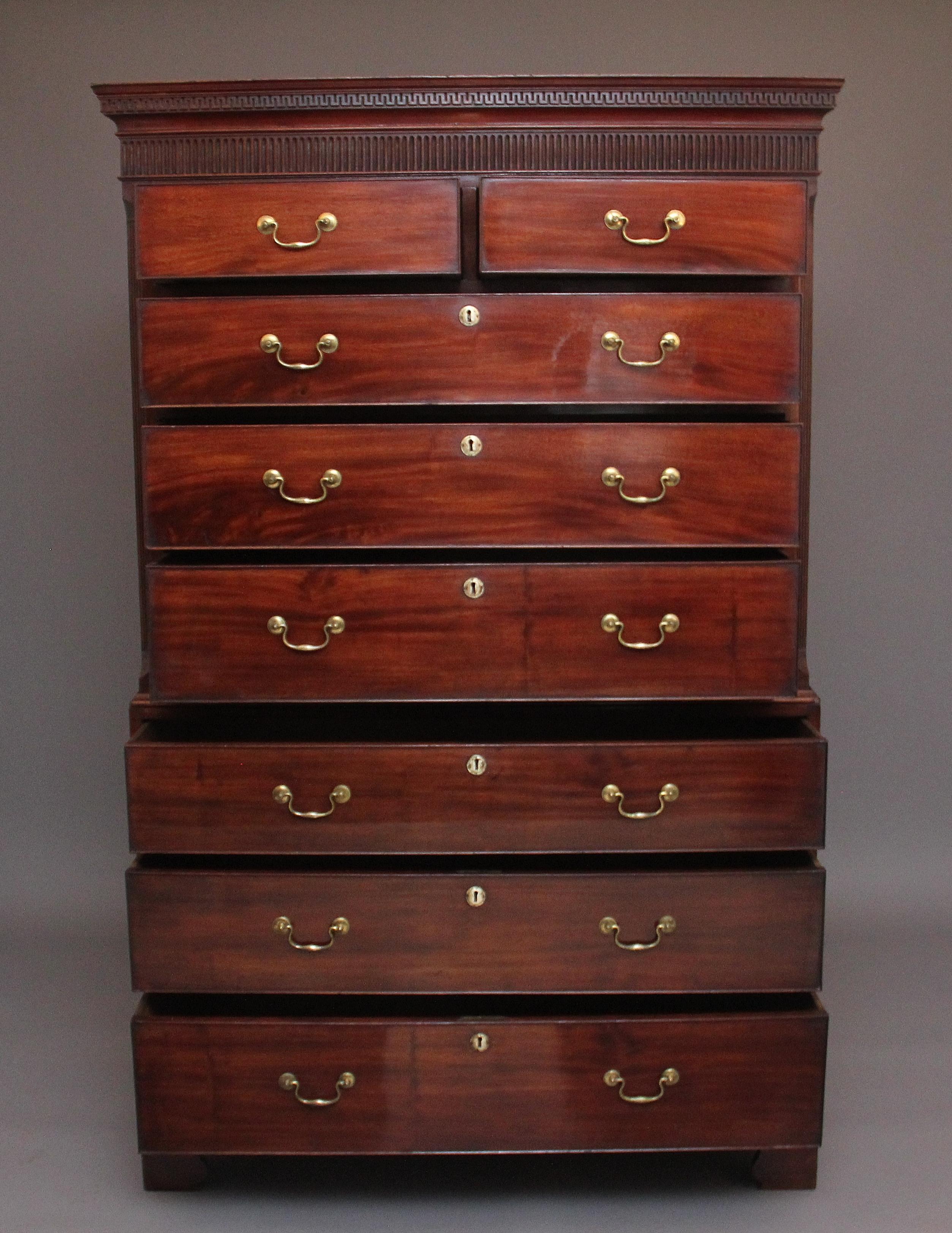 A lovely quality 18th Century mahogany chest on chest, the cornice having decorative Greek key moulding, and a fluted frieze below, canted corners either side, a selection of two short over six long oak lined graduated drawers with the original