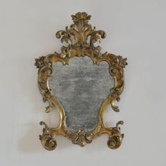18th century antique Italian gilt rococo mirror of cartouche form