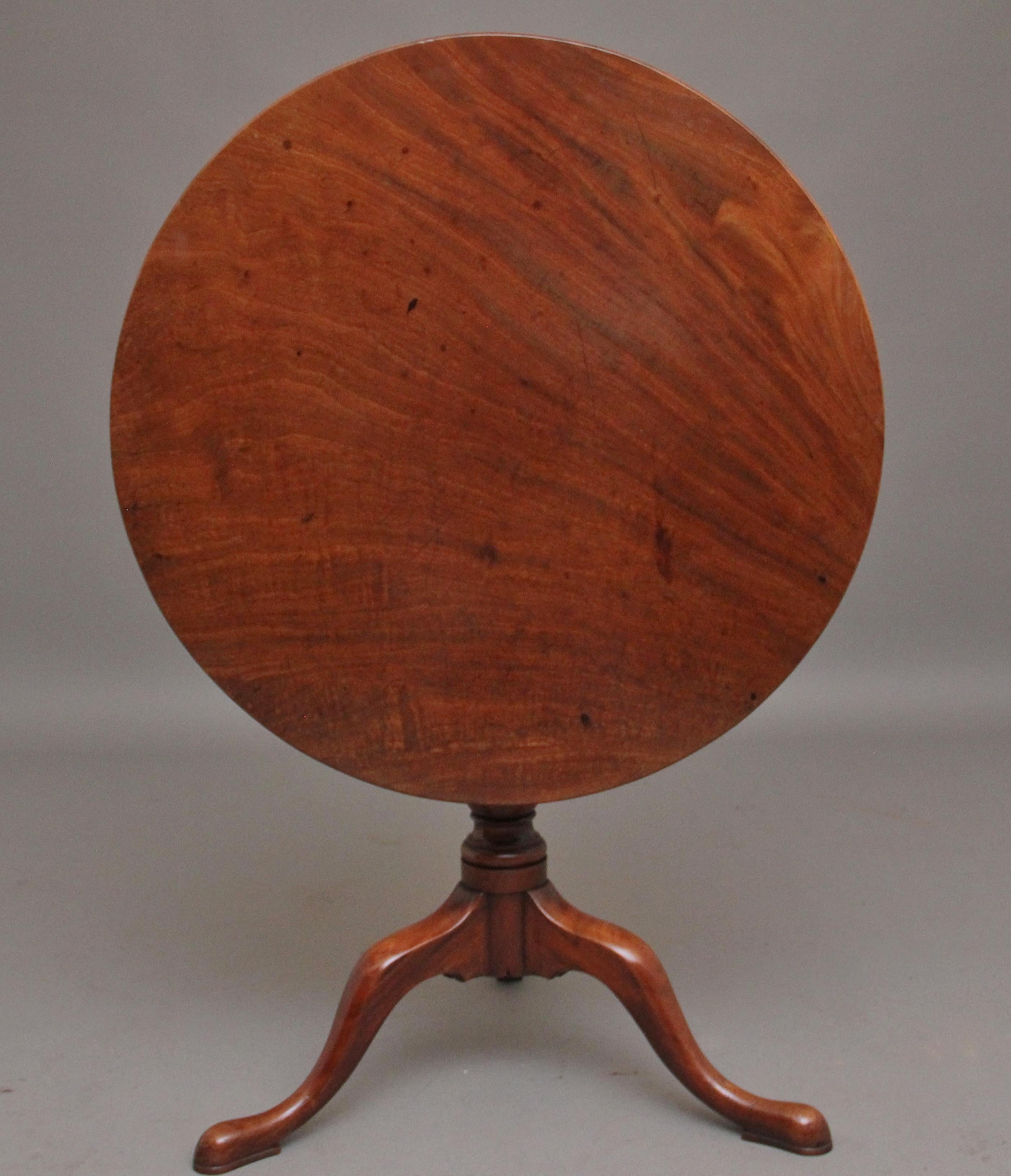 A superb 18th century mahogany tripod table, having a wonderful figured circular top supported on a turned column terminating with three slender shaped legs. Lovely colour and in excellent condition, circa 1780.
