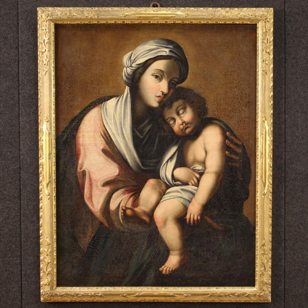 Peinture italienne ancienne de la première moitié du XVIIIe siècle. Cadre huile sur toile représentant un sujet religieux Vierge à l'enfant d'une excellente qualité picturale. Cadre non coeval en bois et plâtre finement ciselé et doré (voir photo)