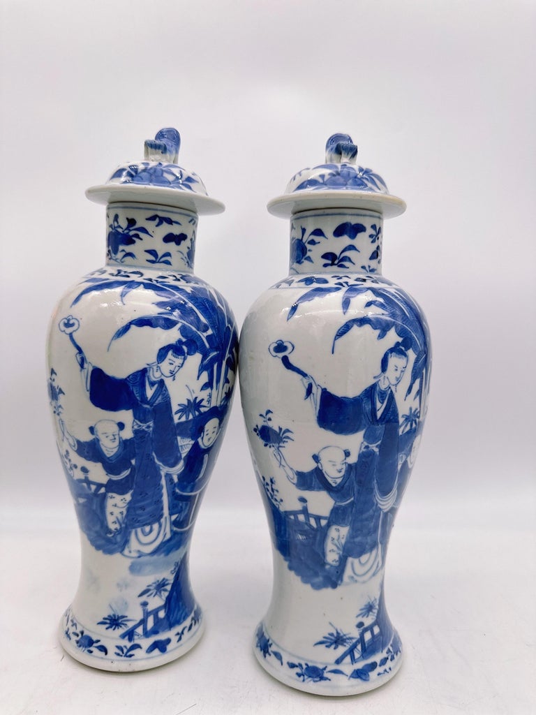 Qing Dynasty pair of antique 18th century Chinese blue and white porcelain jars and covers ,the lids with lions form finials overall decorated with and 3 children and 2 women, no damages ,very beautiful , see more pictures, Measures: 5