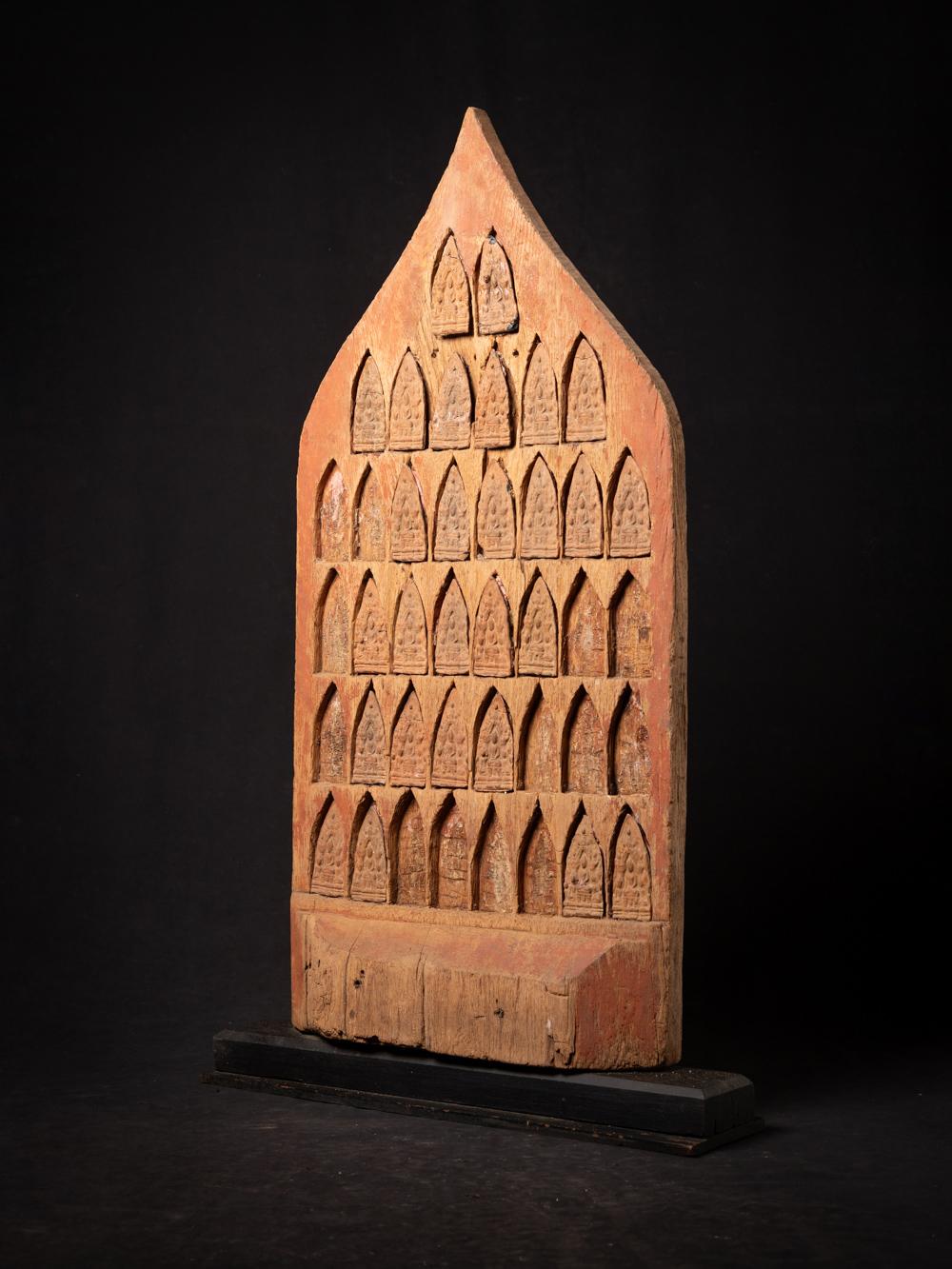 Antique wooden Burmese Temple panel
Material : wood
102,1 cm high
60,3 cm wide and 13,6 cm deep
18th century
With terracotta Buddha amulets
The Buddha amulets are dating from the 14-15th century and were later added in the panel, very special