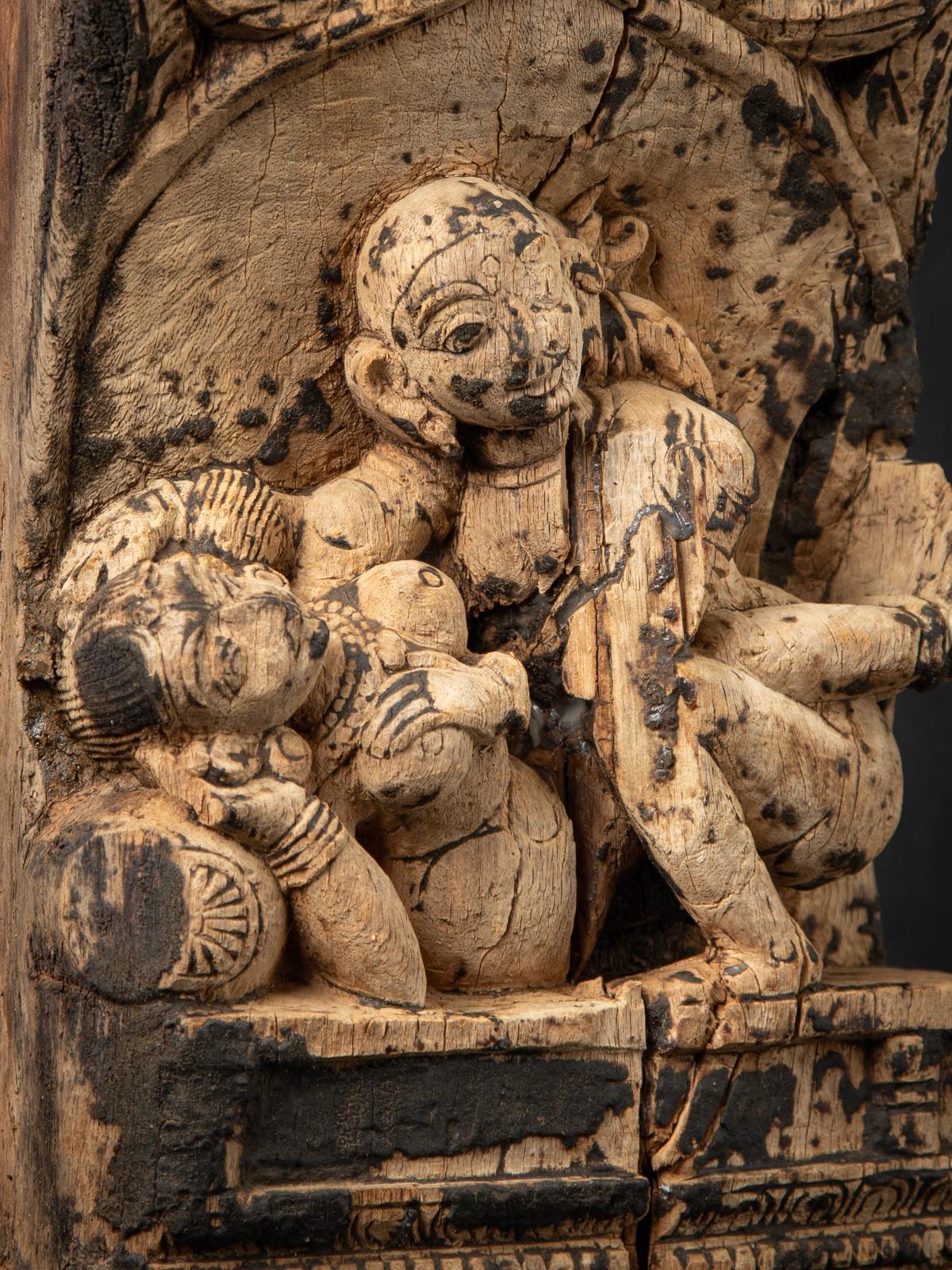 Antique wooden Indian temple panel
Material : wood
52 cm high
25 cm wide and 13,4 cm deep
Originating from an antique Temple Chariot
18th century
With erotic figures
See the last two photos of the temple chariot from which the panel came.
Weight: