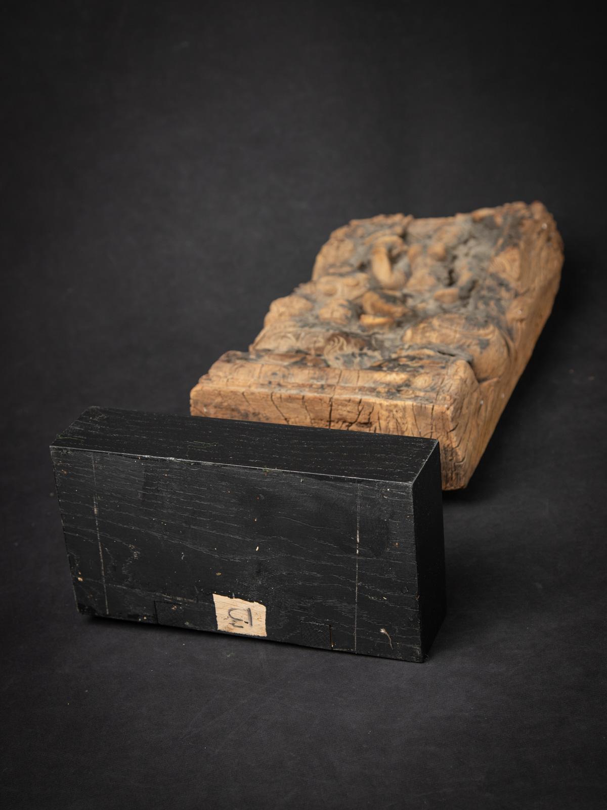 Discover the beauty of this antique wooden Indian temple panel, a stunning piece of history originating from an 18th-century temple chariot in India. Expertly crafted from wood, this panel showcases intricate traditional artistry and serves as a