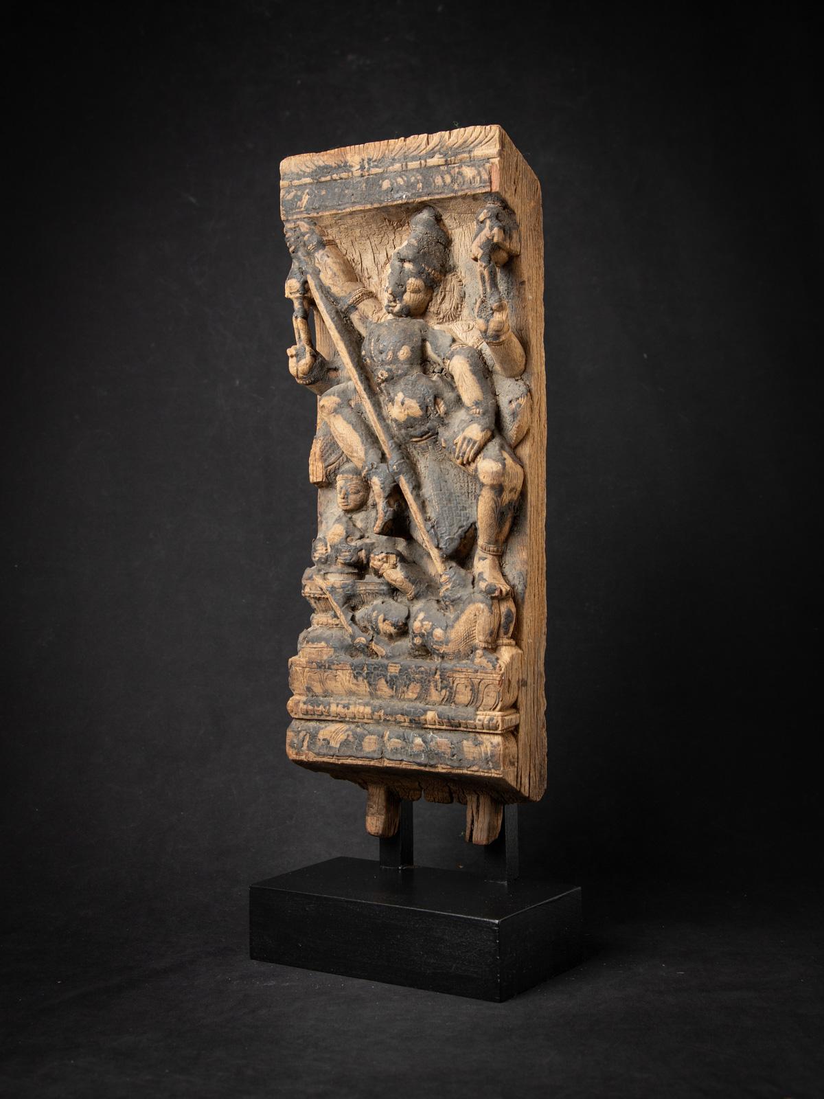 Discover the rich heritage of Indian temple artistry with this antique wooden Indian temple panel, an exquisite 18th-century artifact originating from an antique temple chariot. Crafted from solid wood, this intricately carved panel stands 63 cm