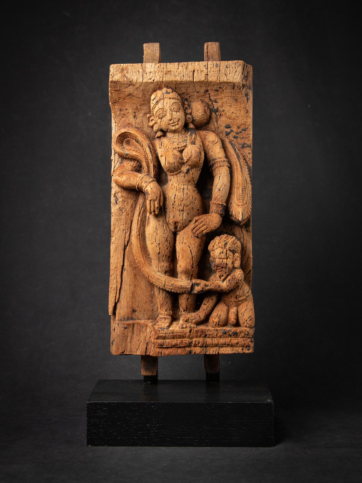 Antique wooden Indian temple panel from , 18th century

Material : wood
55,3 cm high
25 cm wide and 13,4 cm deep
Originating from an antique Temple Chariot
18th century
See the last two photos of the temple chariot from which the panel came.
Weight: