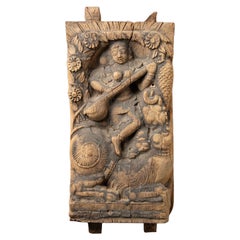 18th century Antique wooden panel of the goddess Saraswati from India