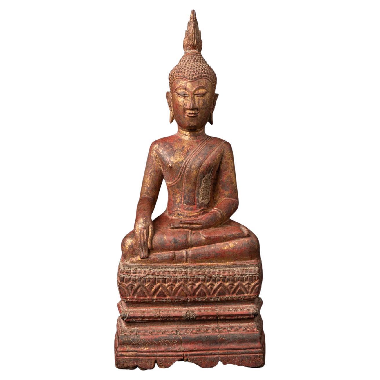 Antike thailändische Buddha-Statue aus Holz aus dem 18. Jahrhundert in Bhumisparsha Mudra im Angebot