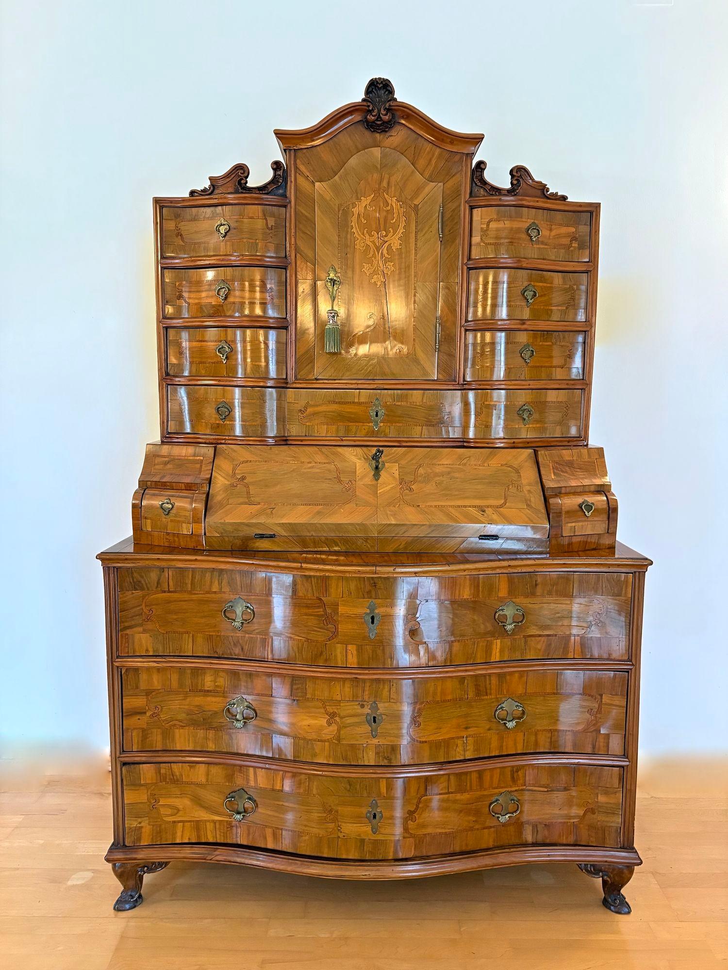 Remarkable 18th Century baroque secrétaire/ bureau cabinet elaborately handcrafted in the period around 1770 in Austria. As former part of the inventory of an old Upperaustrian castle, this incredible piece of baroque furniture was made with