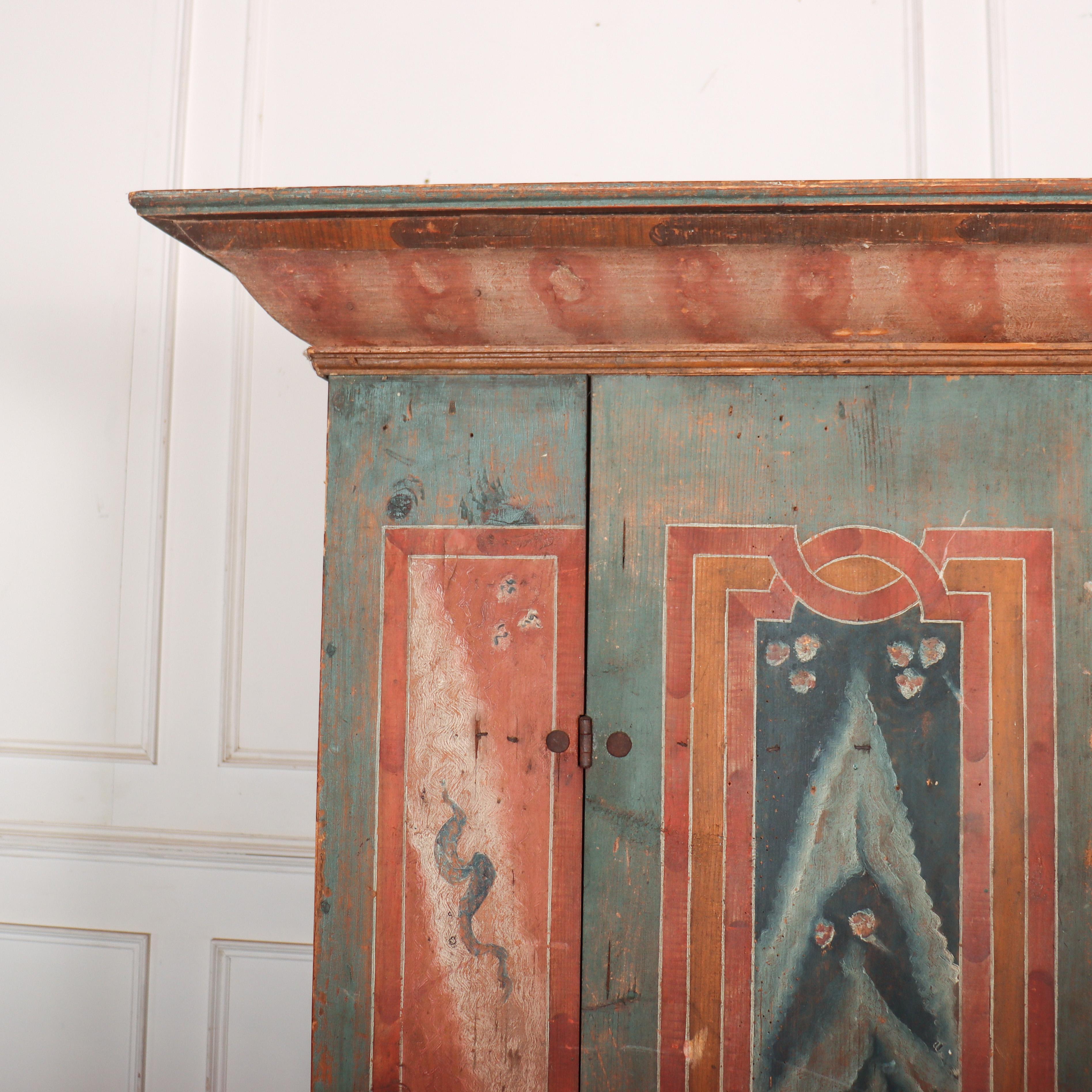 18th century Austrian original painted marriage armoire. Breaks down into four sections for transport, these are the cornice, plinth and two body sections. 1780.

Internal depth is 16.5