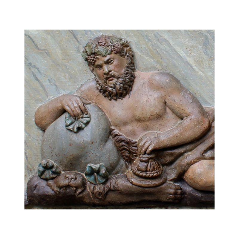 XVIII century 

Bas-relief panel depicting Bacchus

Carved wood, 47 x 137 cm

In this eighteenth-century polychrome relief we find Bacchus depicted in the center, god of wine and mysteries, symbol of intoxication, sensuality, of the strongest