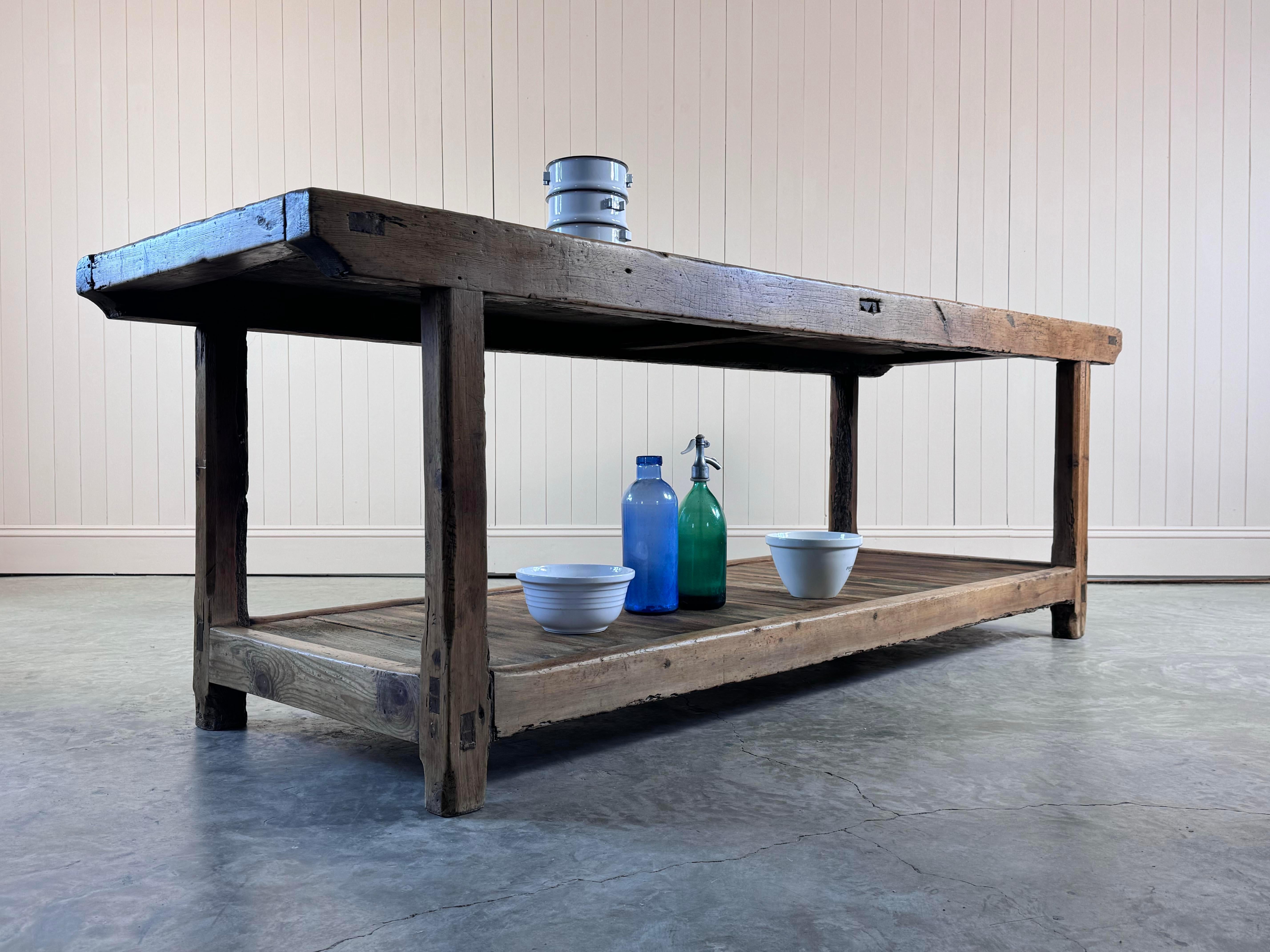 We sourced this beautiful table from a house in Lucca, just North of Pisa, in Italy.
We were very drawn to the beautiful honey colour and the amazing framed single plank of oak, that makes the top.

A simple shape with stunning very smooth oak.  We